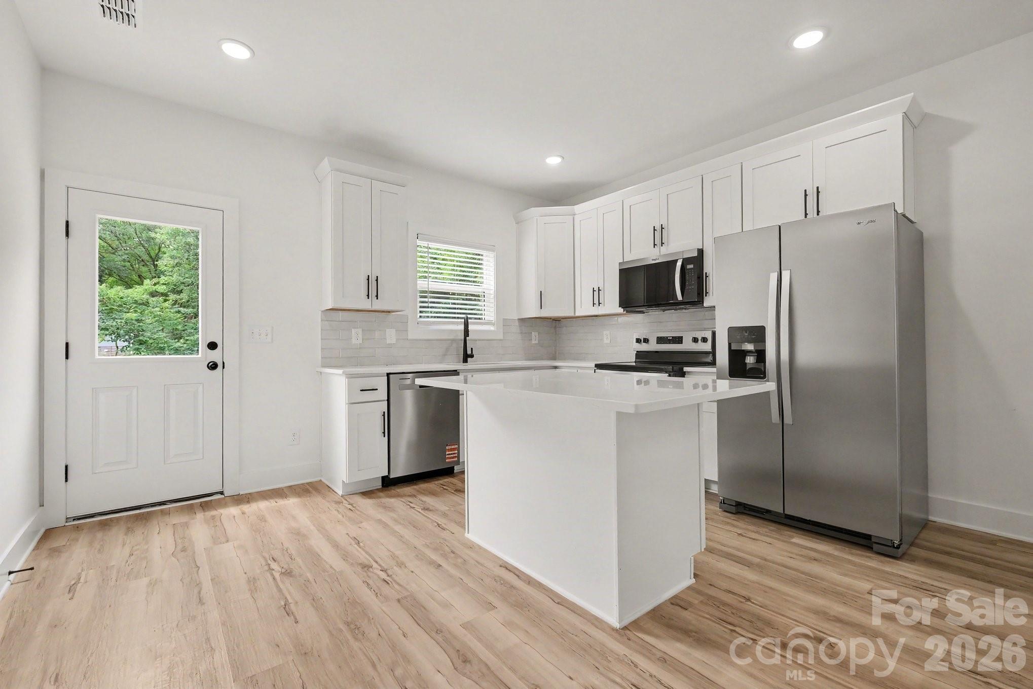 Single Family Residence at 308 E Talleyrand Avenue, Monroe, photo 6 of 22