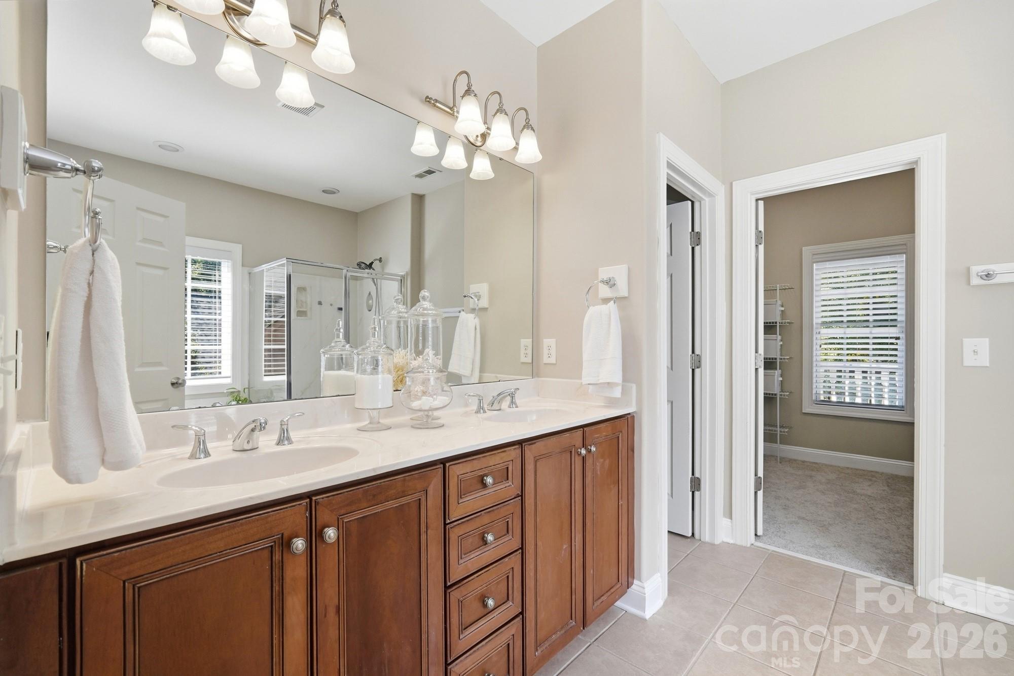 Primary bathroom with double sinks, garden tub and separate shower - 8101 Prescot Glen Parkway, Waxhaw