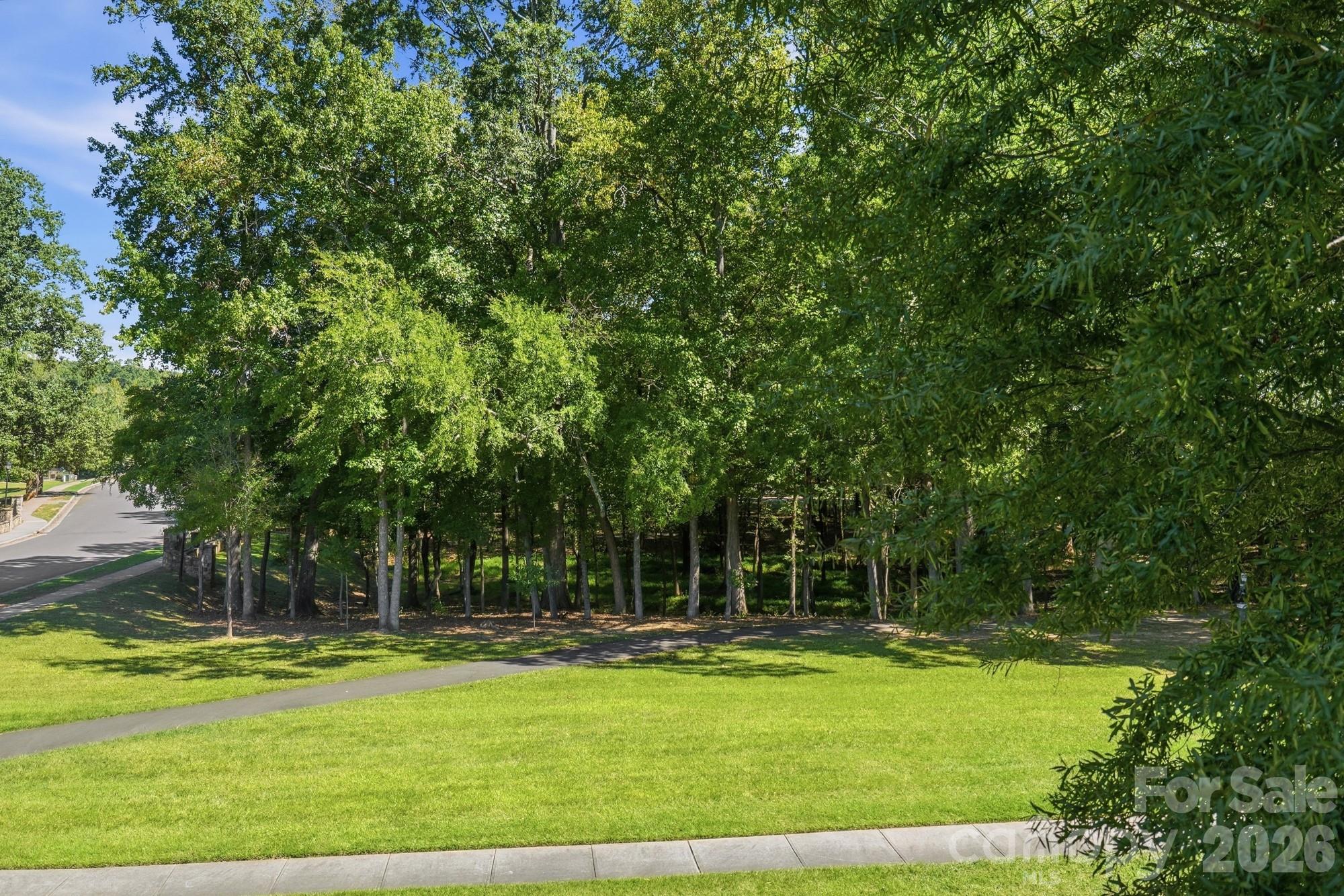 Home overlooks the beautiful Prescot Green Space with walking trails connected to Carolina Thread. - 8101 Prescot Glen Parkway, Waxhaw