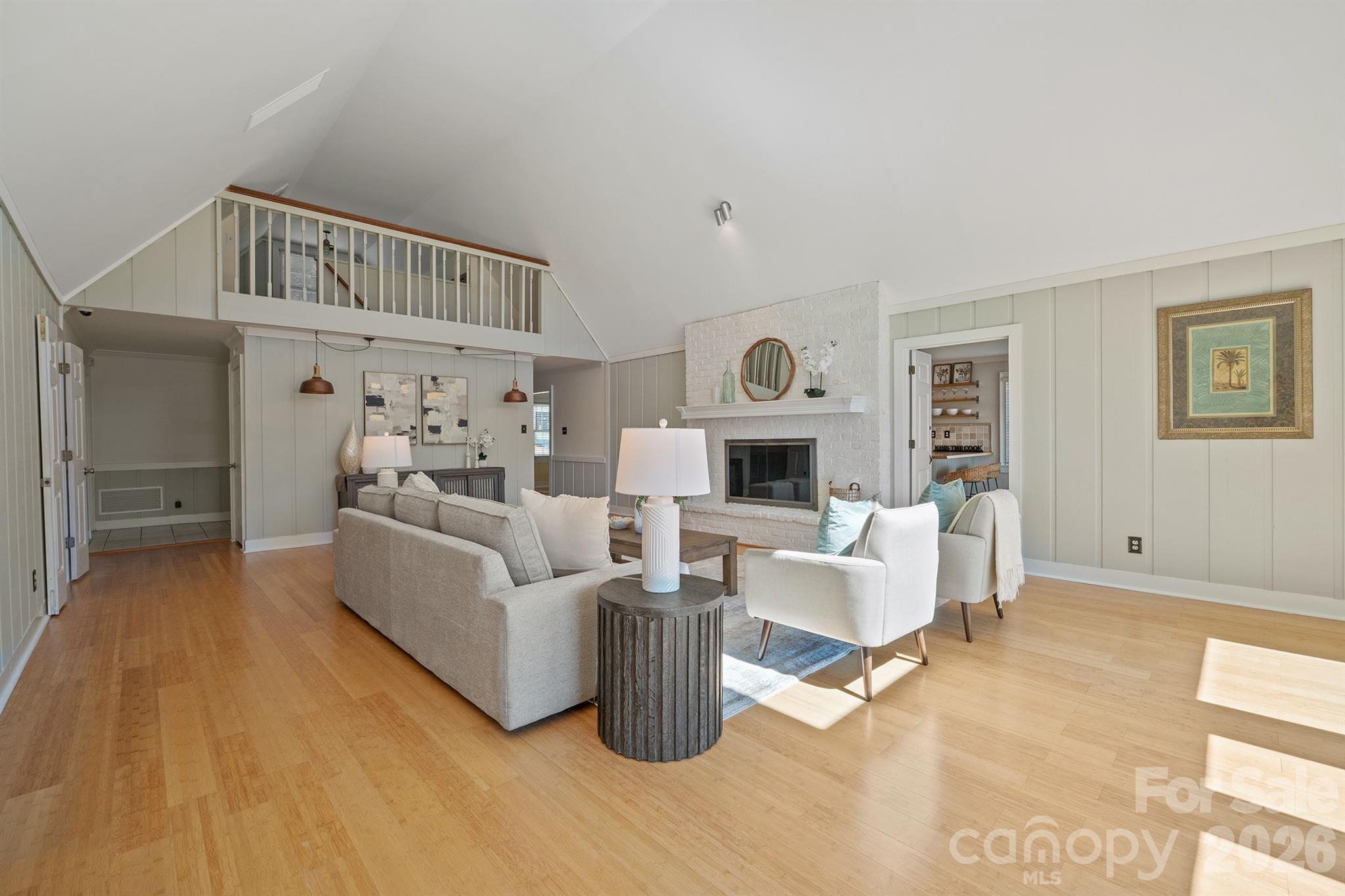 Great room showing the loft area above - 20919 Island Forest Drive, Cornelius