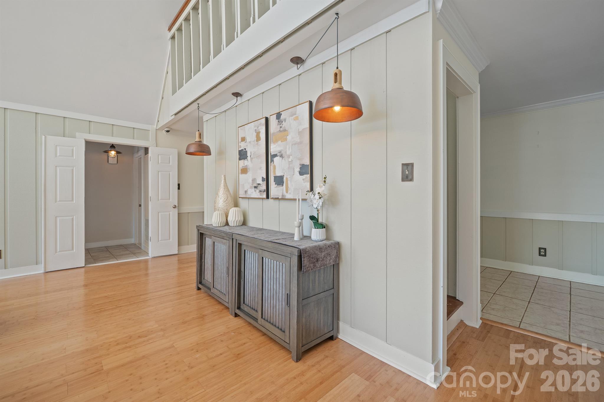 Room for sitting area or credenza as shown here or showcase your favorite artwork - 20919 Island Forest Drive, Cornelius