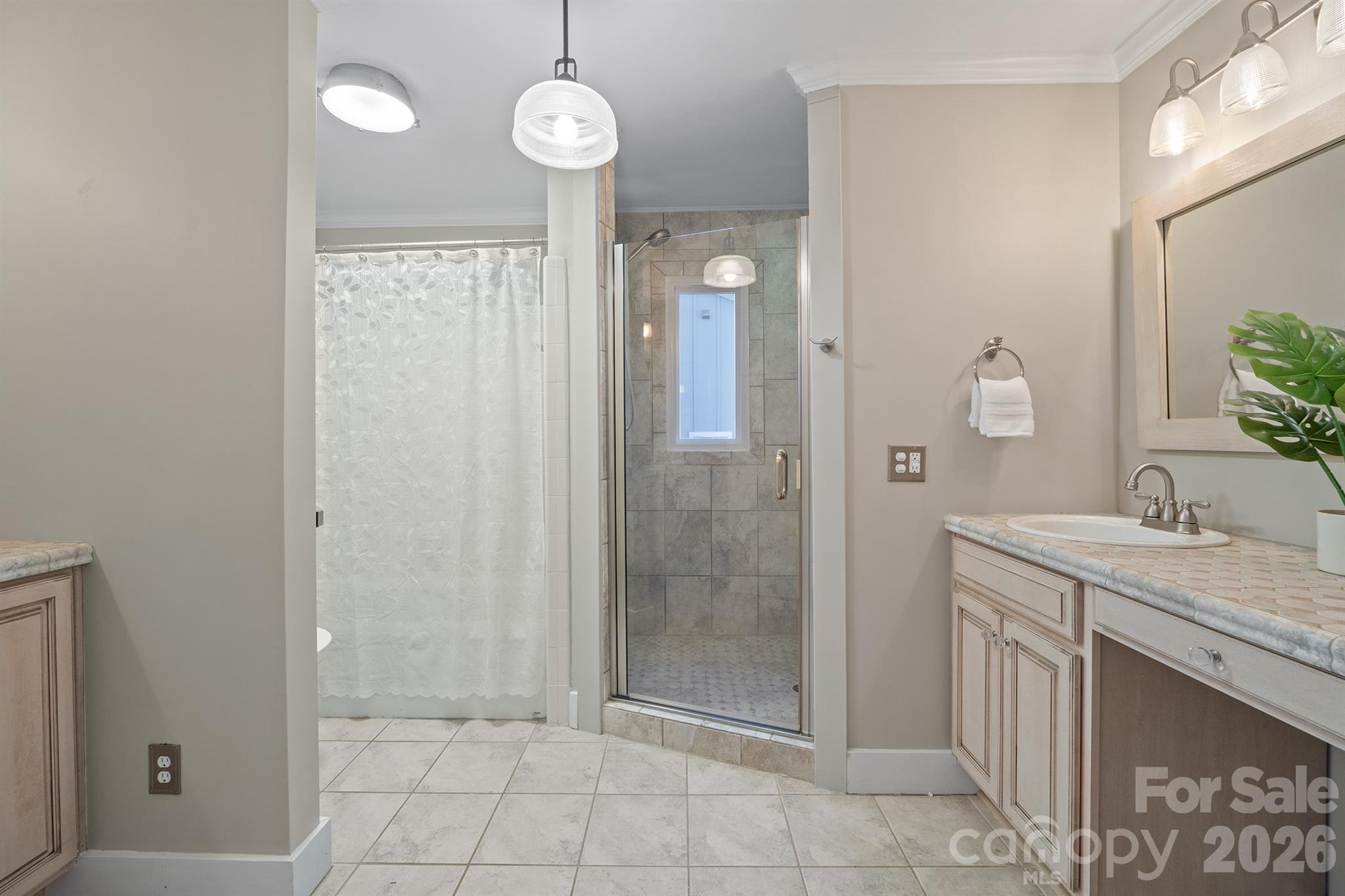Primary bath has dual vanities and 3 shower heads - 20919 Island Forest Drive, Cornelius