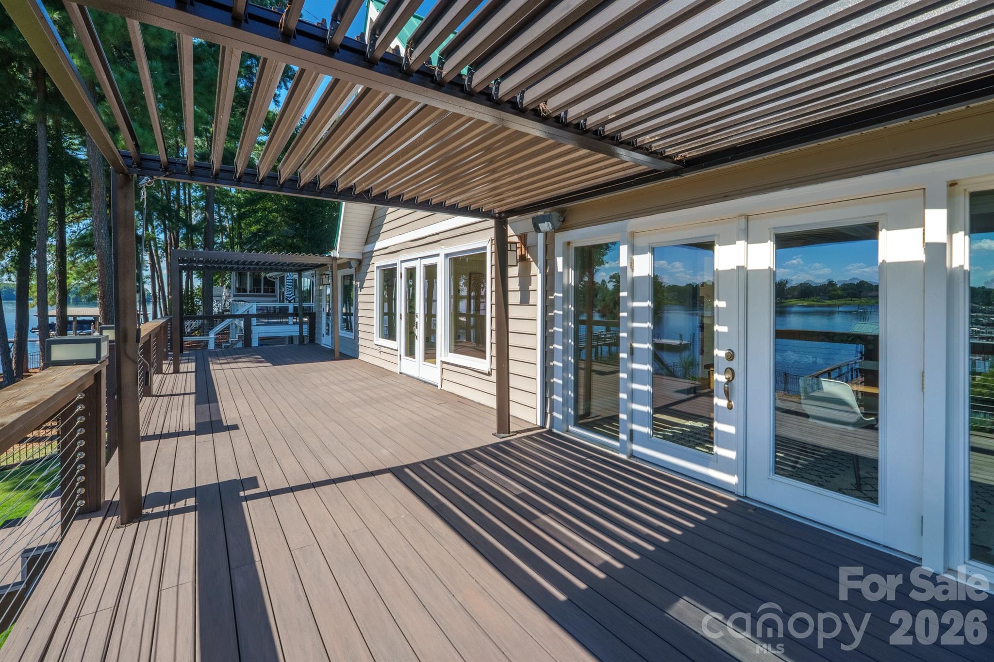 Full deck with 2 pergolas at either end that can be open or closed for roof - 20919 Island Forest Drive, Cornelius