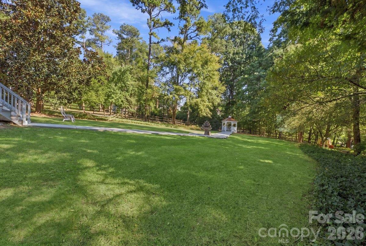 large private backyard with gazebo and fountain - 178 Cove Creek Loop, Mooresville