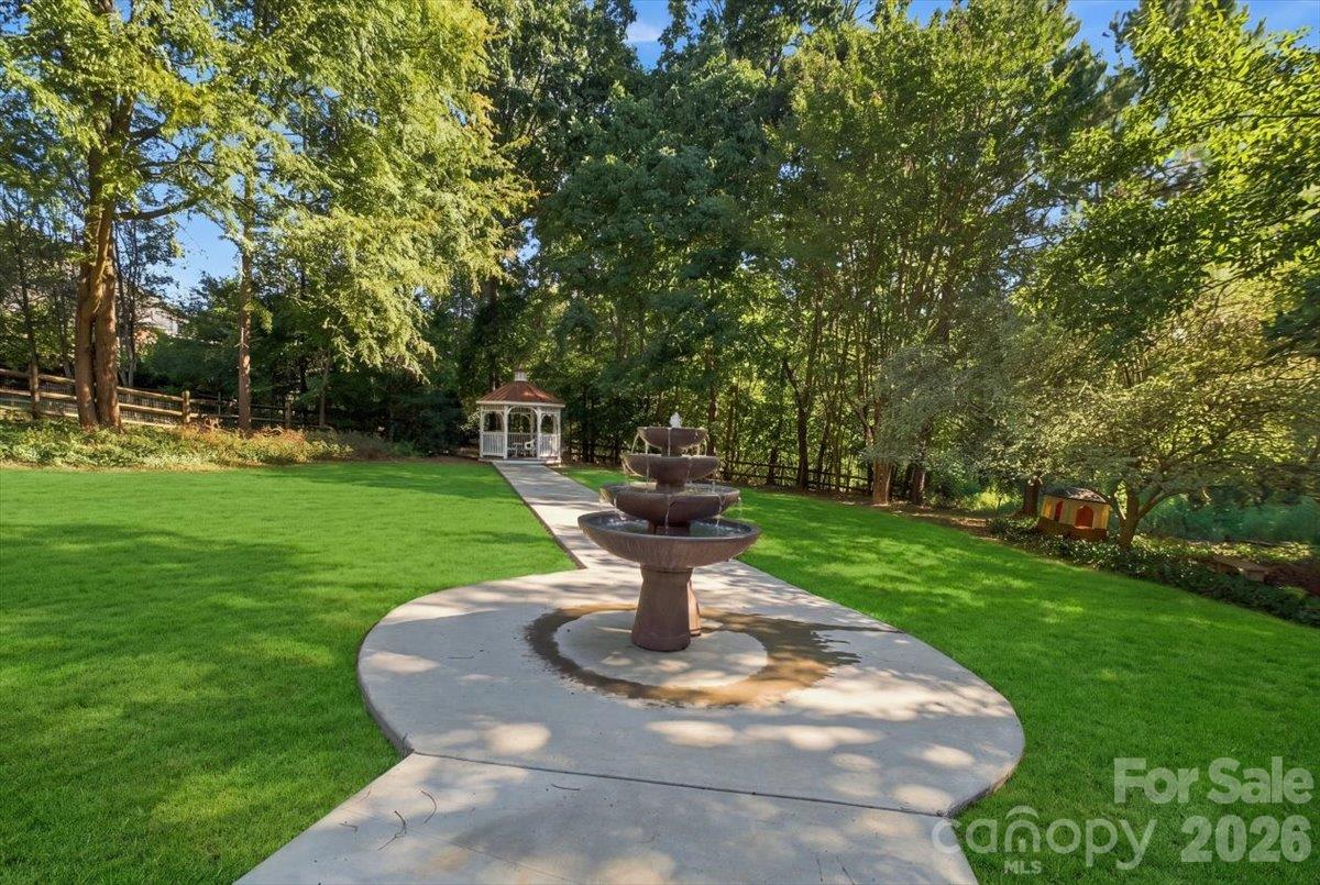 large private backyard with gazebo and fountain - 178 Cove Creek Loop, Mooresville