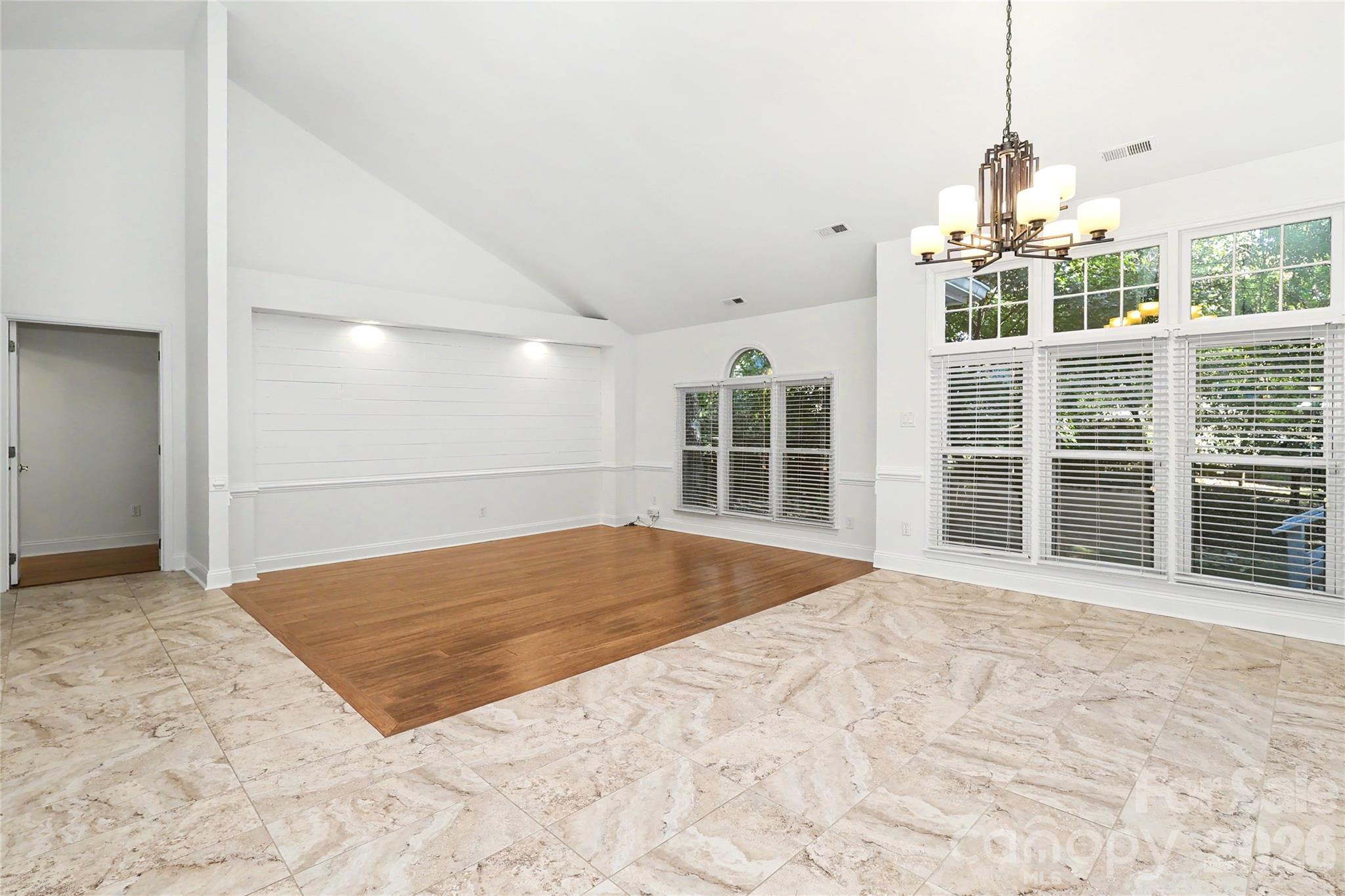 Open Living area and Dining Area - 9931 Deer Spring Lane, Charlotte