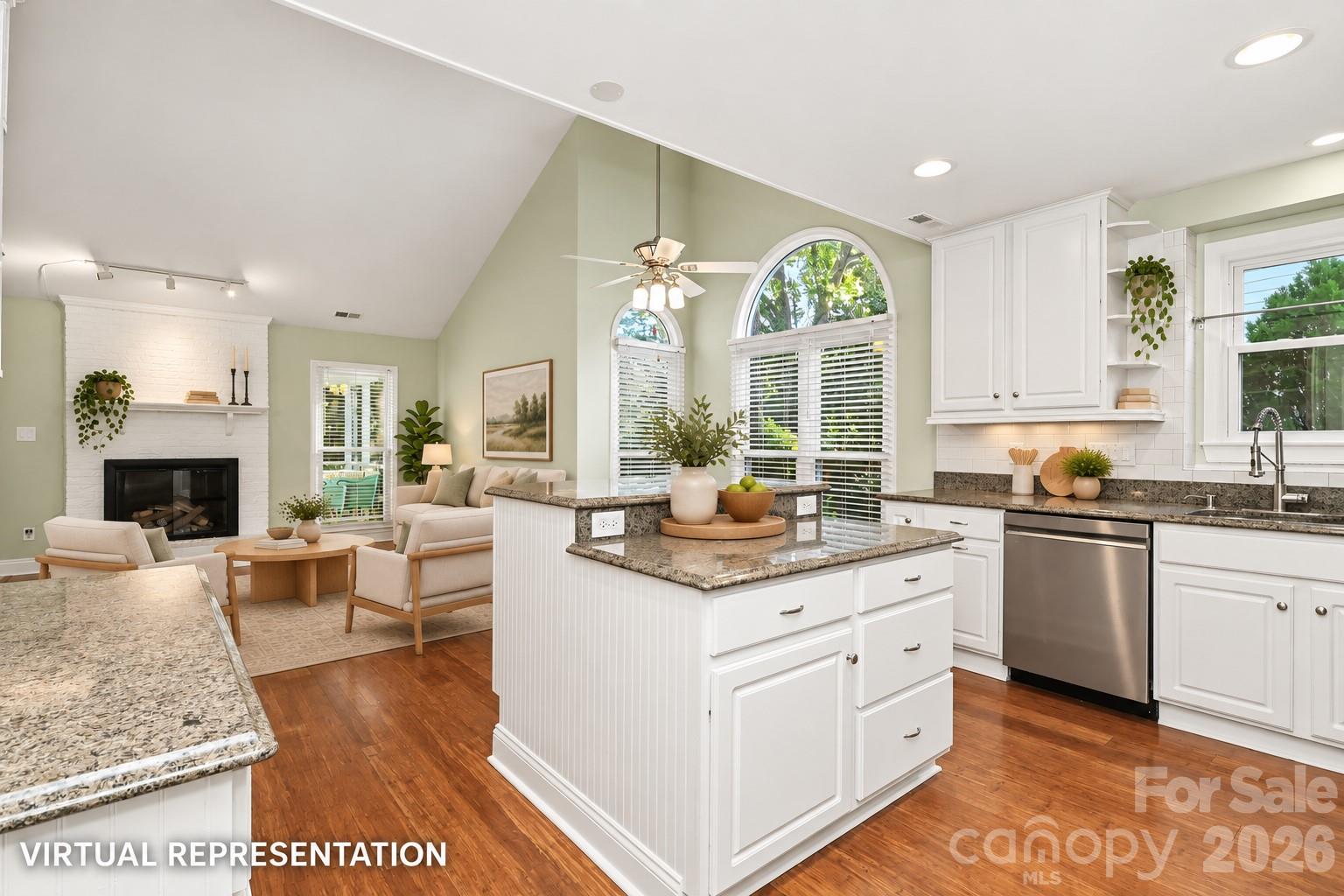 Kitchen featuring island, gas range, stainless - 9931 Deer Spring Lane, Charlotte