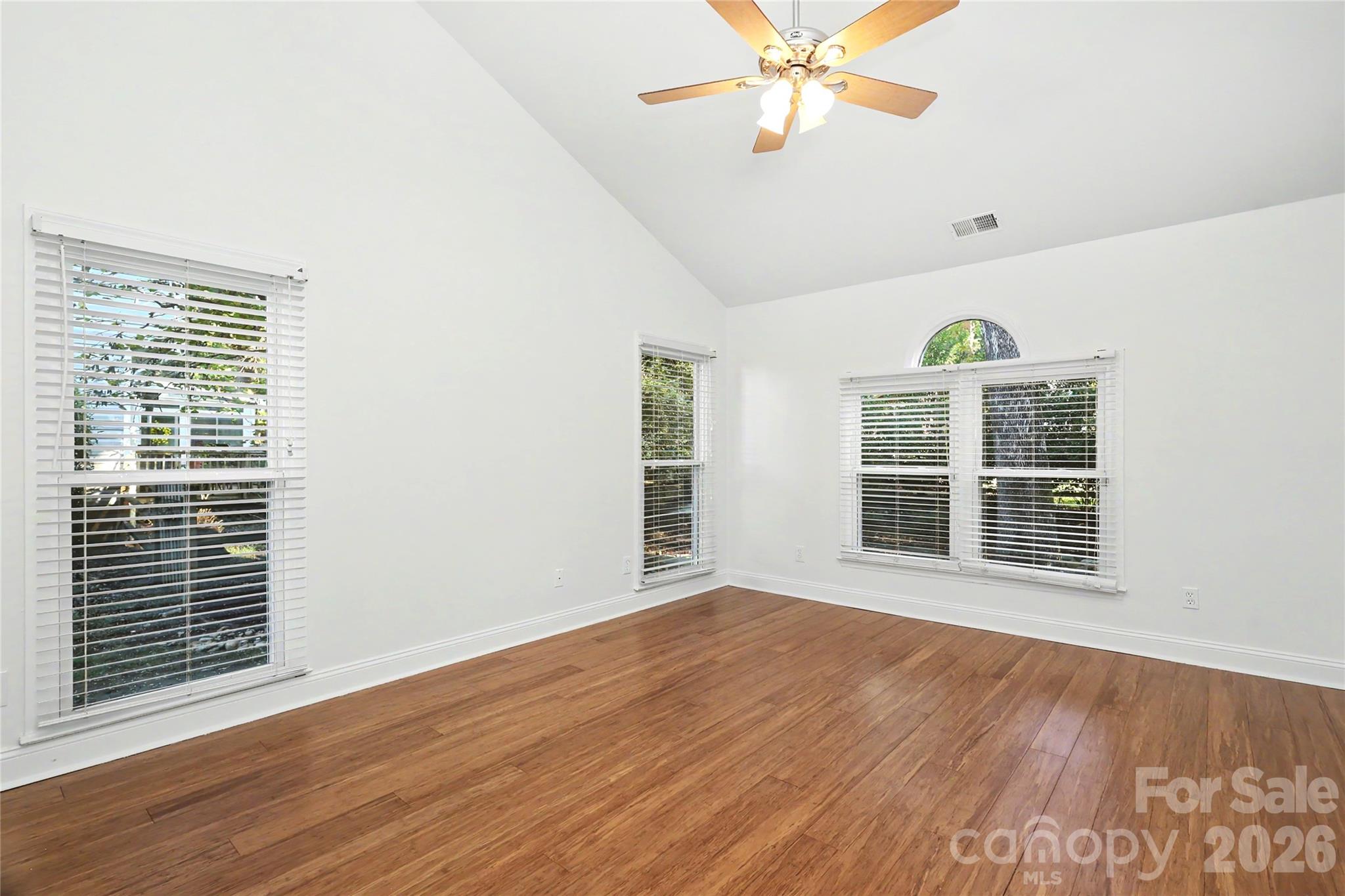 Primary Bedroom with vaulted ceiling - 9931 Deer Spring Lane, Charlotte