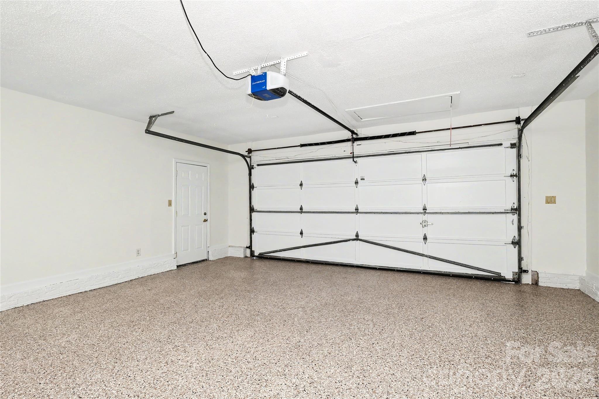 Two car garage with epoxy floor - 9931 Deer Spring Lane, Charlotte