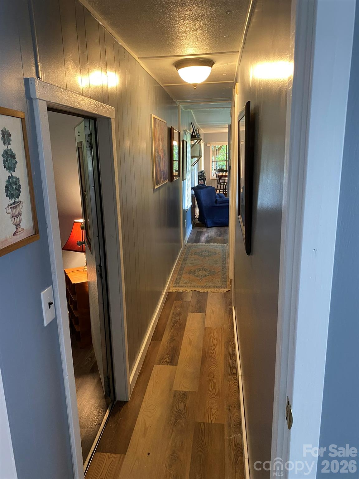 Hall leading to bedrooms and bathroom - 987 Angelwood Lane, Hendersonville
