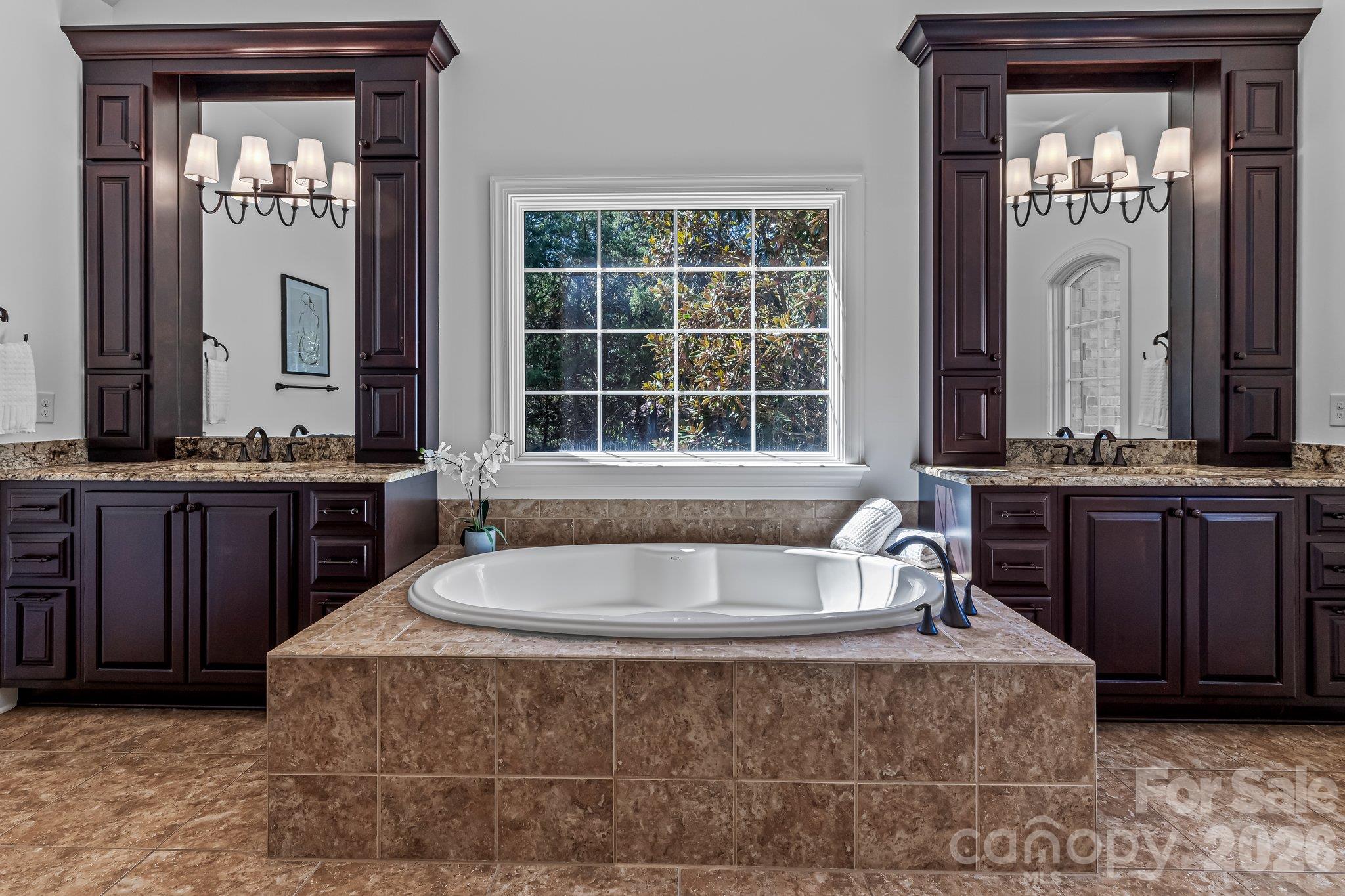 Primary bathroom w/ separate walk-in closets too! - 227 Glenmoor Drive, Waxhaw