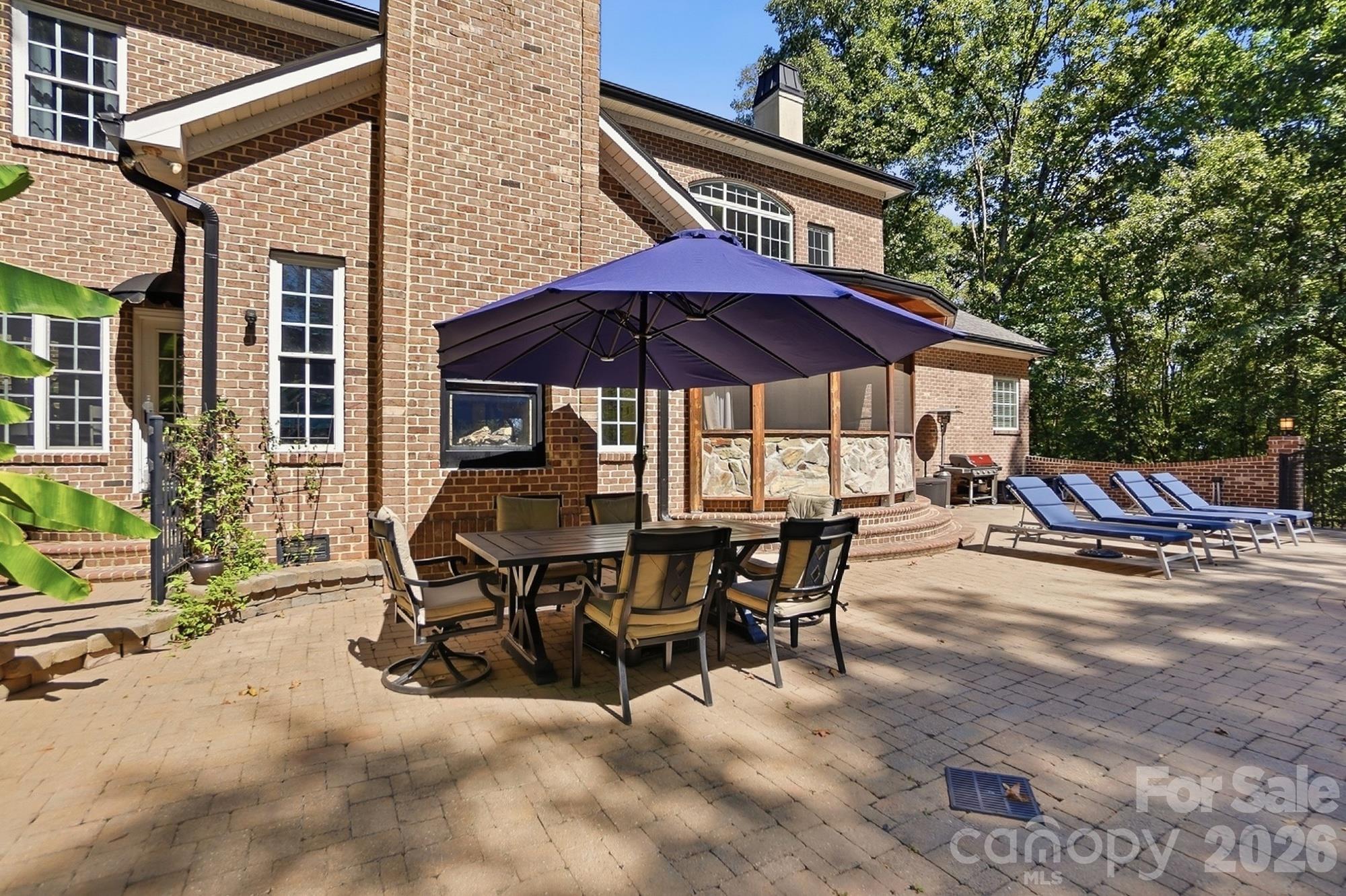 Extended Custom patio with 2 way Fireplace - 2930 Sweetgrass Lane, Monroe