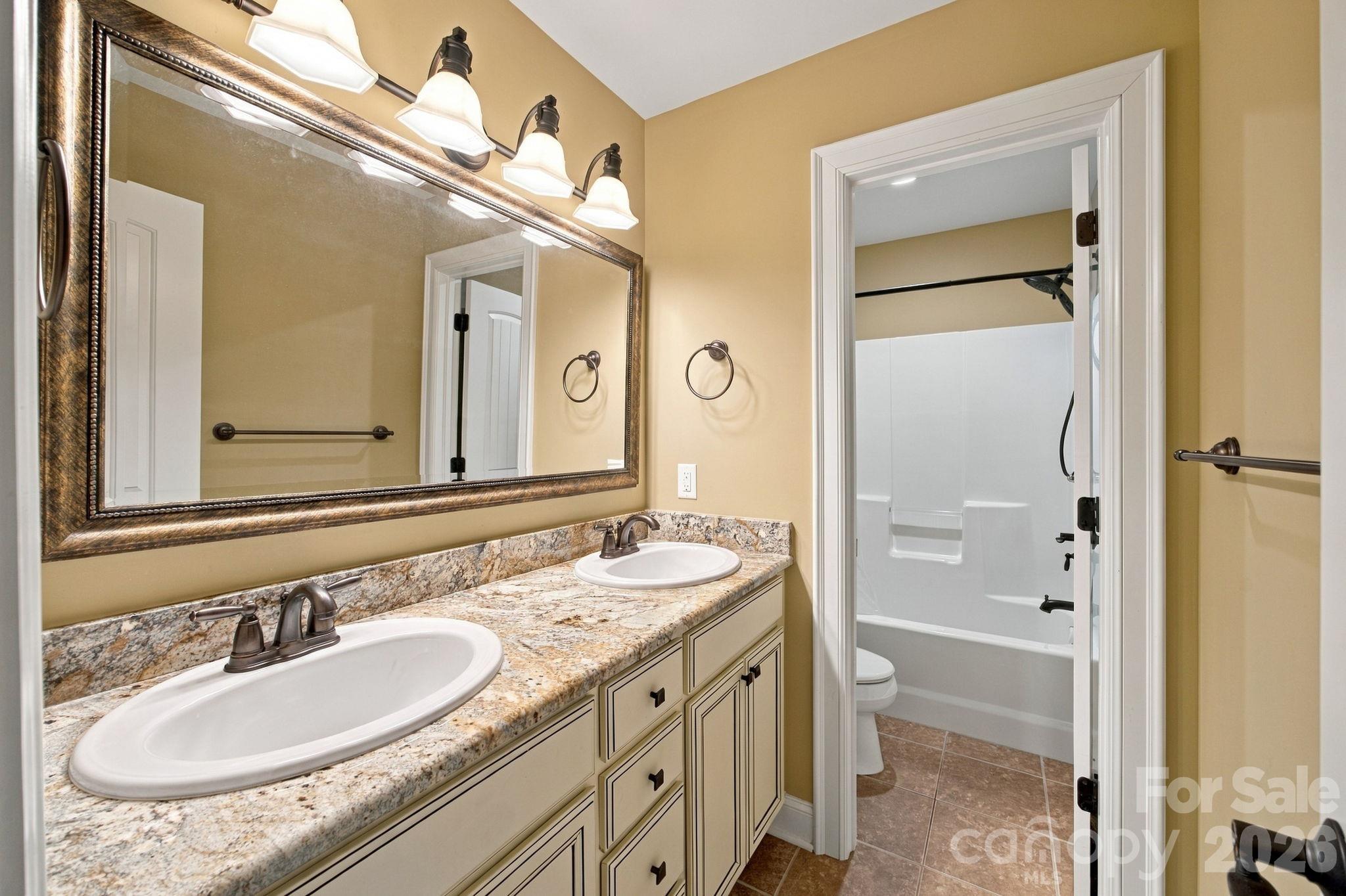 Upper level bathroom - 7481 Brotherton Road, Denver