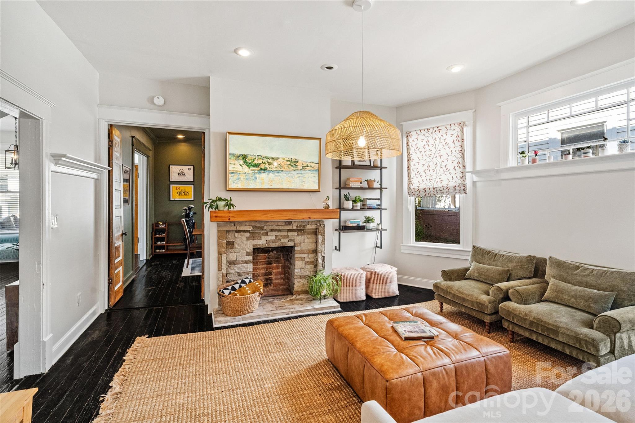 High ceilings and windows on three sides give the living room a grand, spacious feel - 233 Marion Street, Rock Hill