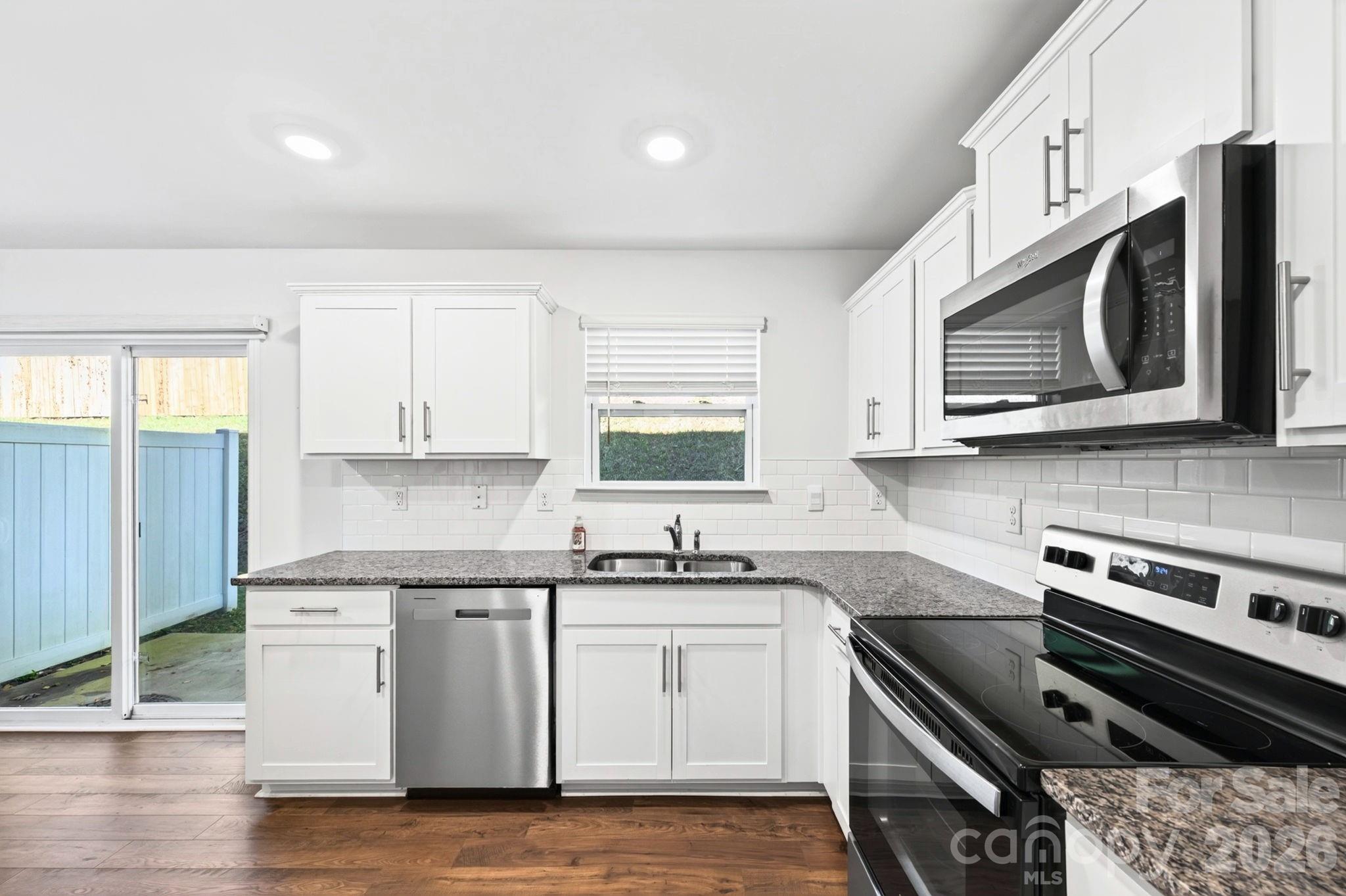 Kitchen with Granite Counters and Stainless Appliances - 15 Virginia Commons Drive, Arden