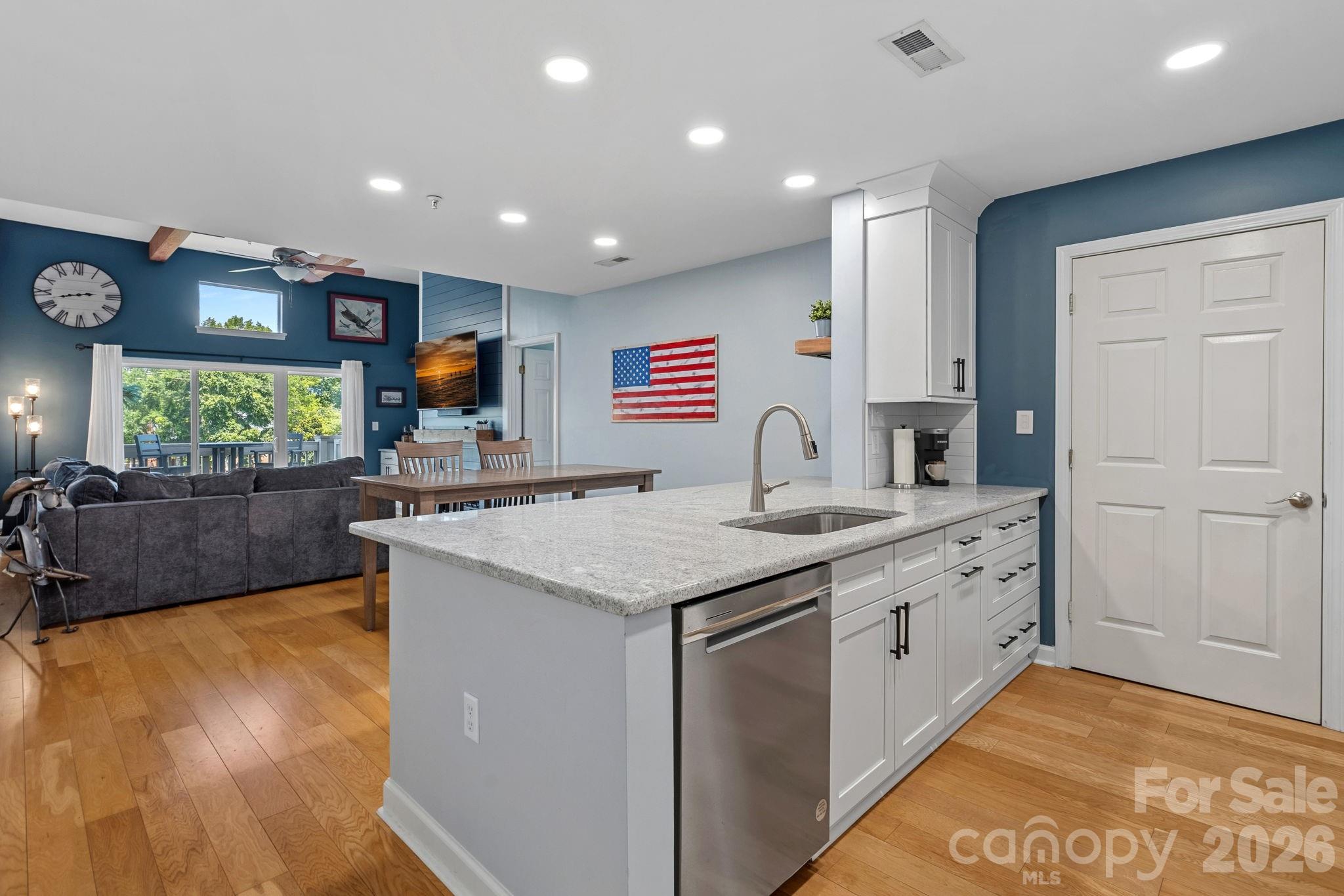 Updated Kitchen with Quartz Countertops, New SS appliances (2023) - 103 Pier 33 Drive, Mooresville