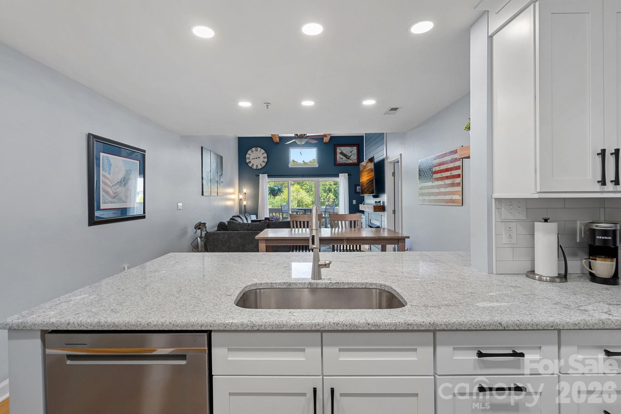 Updated Kitchen with Quartz Countertops, New SS appliances (2023) - 103 Pier 33 Drive, Mooresville