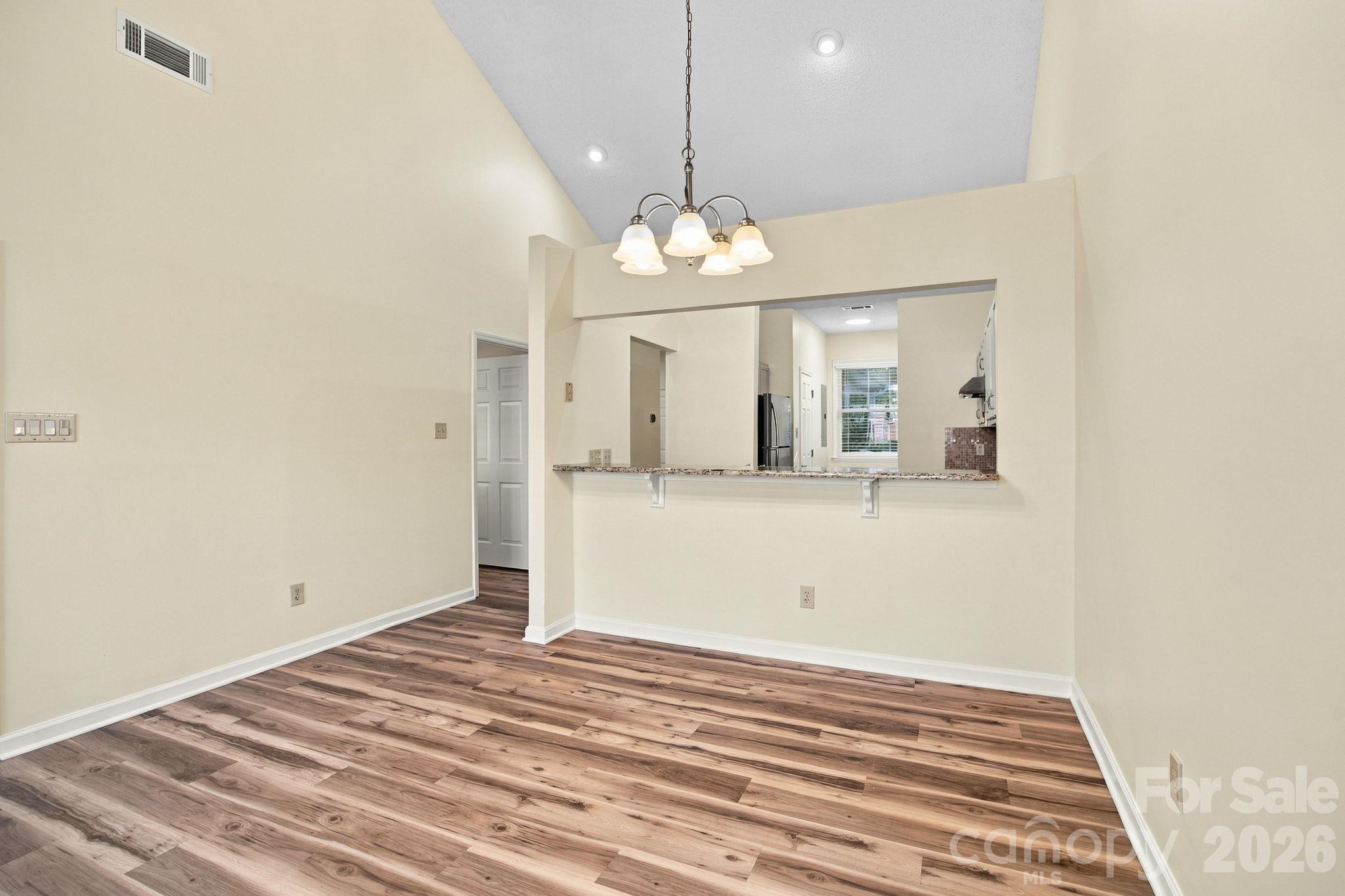 Dining area looking into the kitchen - 19838 Oak Leaf Circle, Cornelius