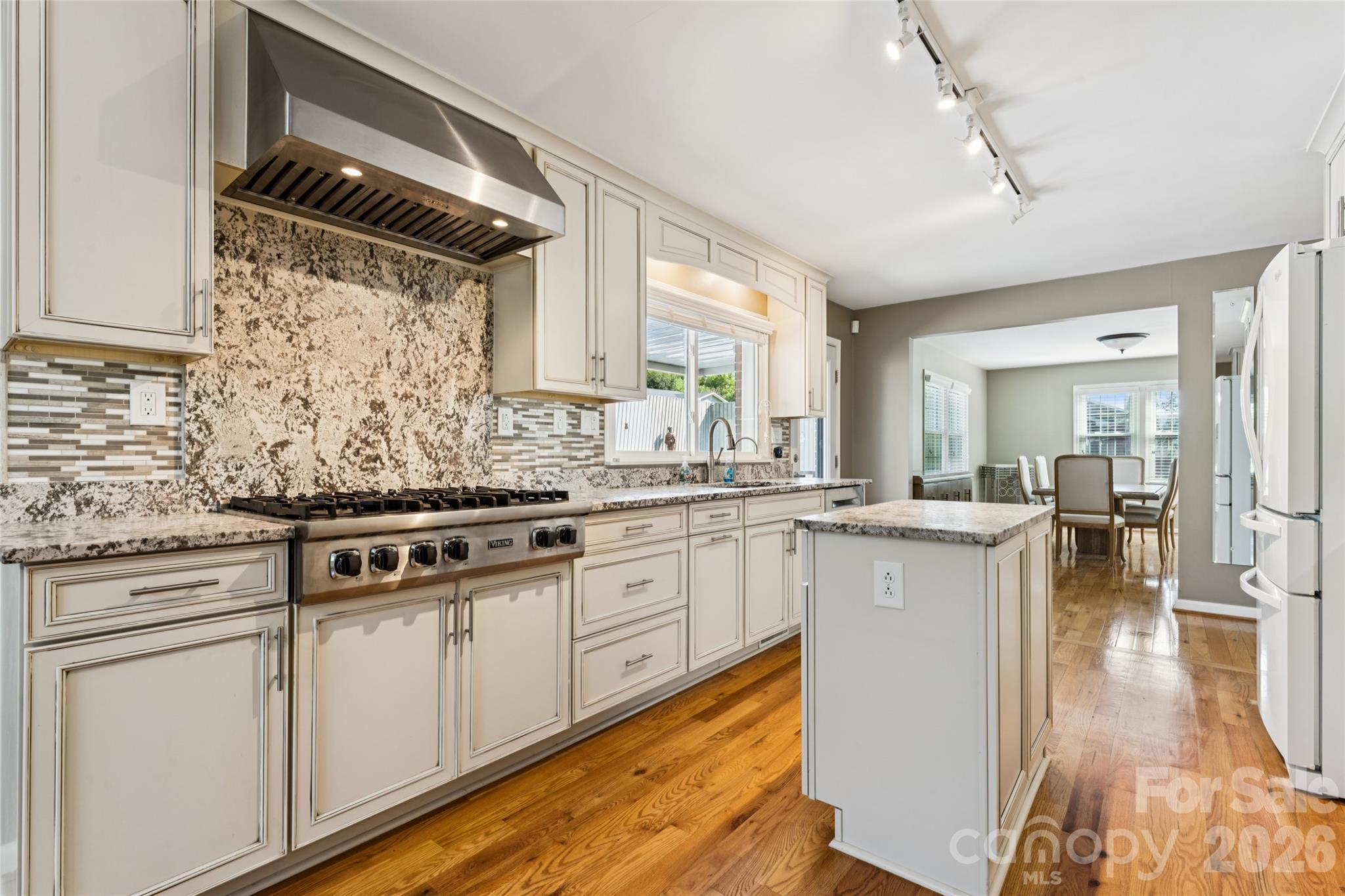 Single Family Residence at 7 Indian Trail Road, Candler, photo 14 of 46
