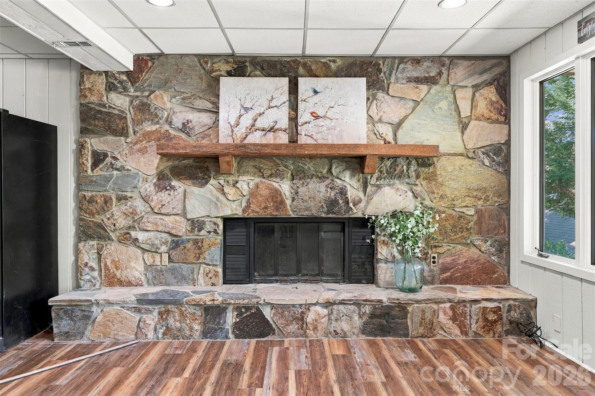 Lower level Rec/ Bonus room with wood burning fireplace and fantastic water views - 9071 Tulagi Court, Tega Cay