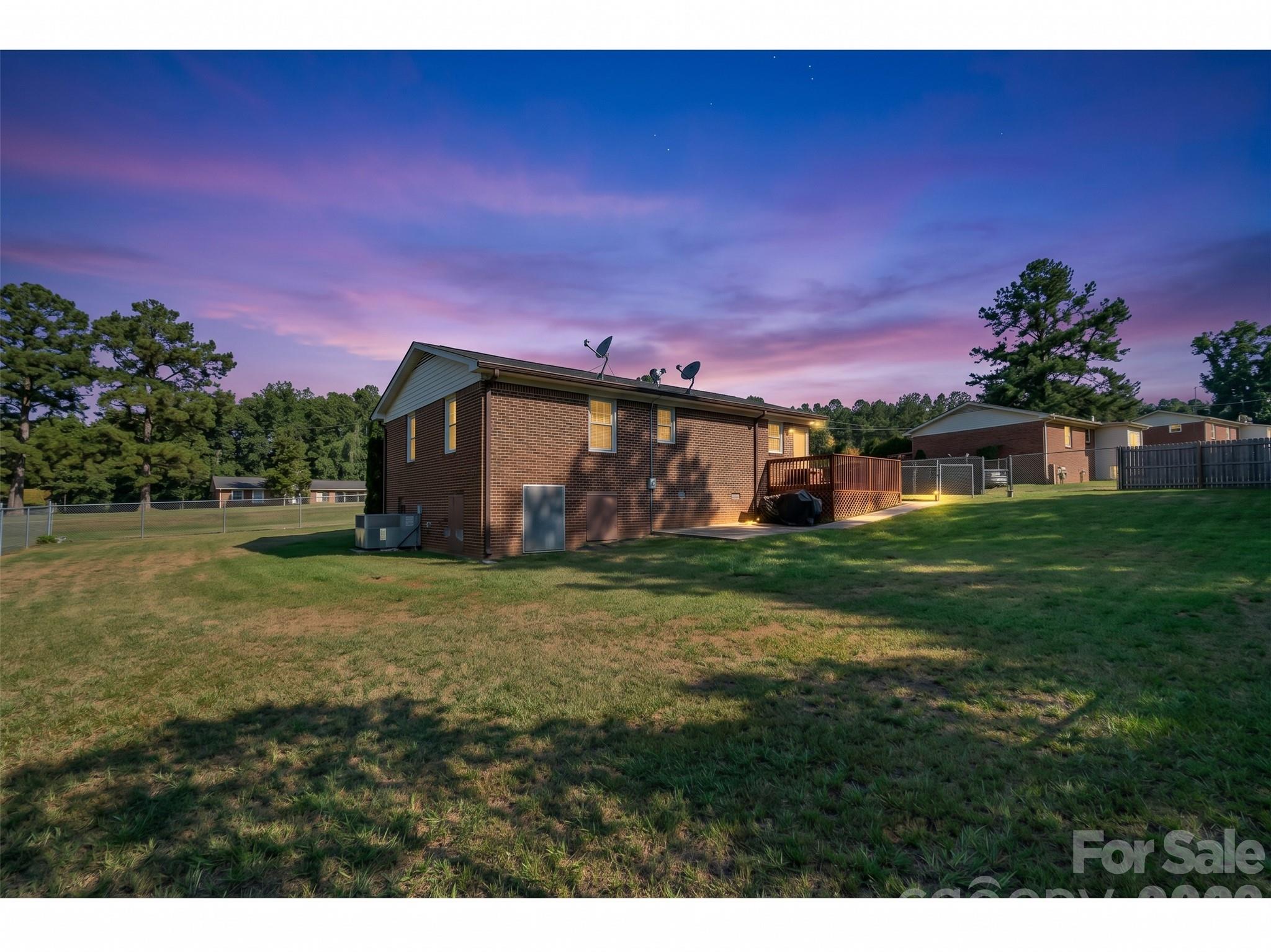 AI-Twilight View of the Backyard and back porch - 645 Pine Ridge Road, Chester