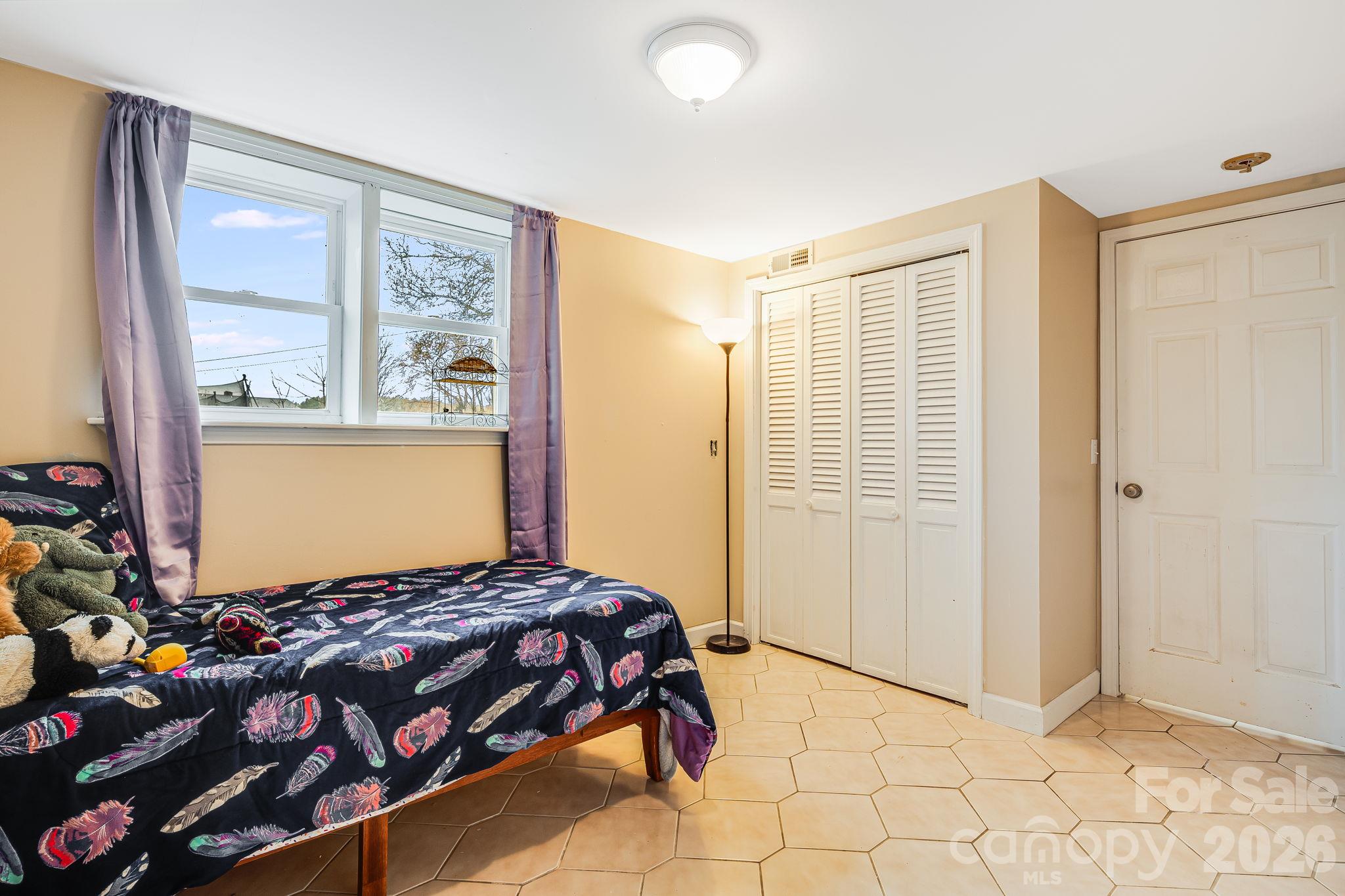 Bedroom 2 on lower level / basement - 195 Whitmire Road, Brevard