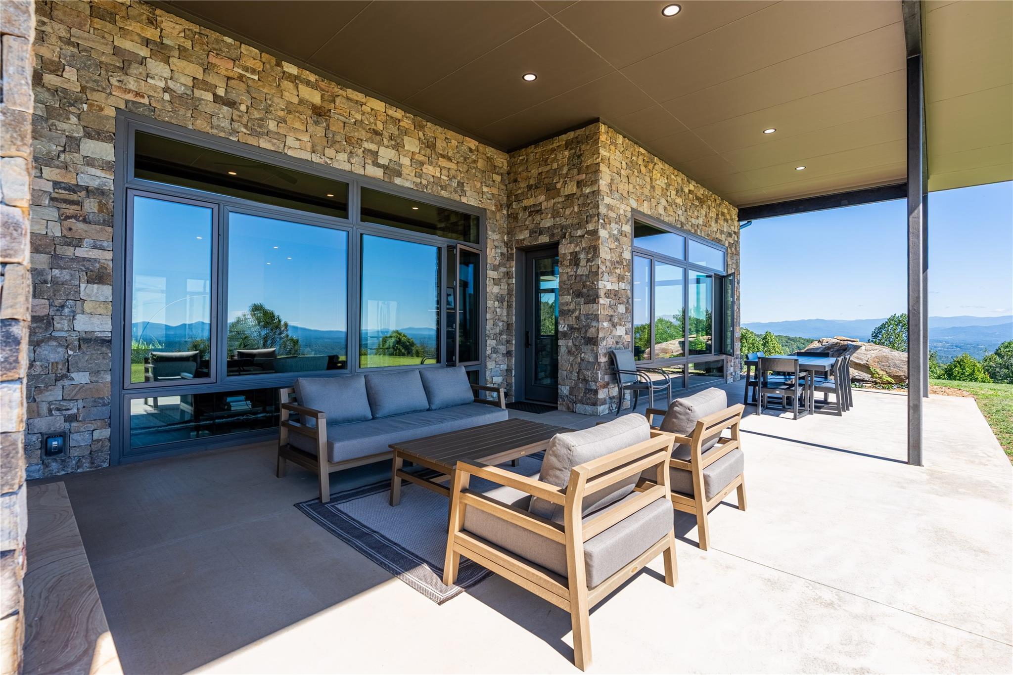 Main House- Outdoor Living Space with Fireplace and Fountain - 1045 & 1047 Graham Road, Marshall