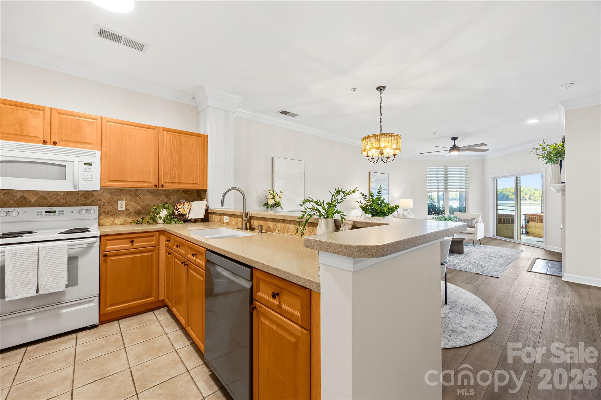 Open concept living with water views from all directions! - 915 Northeast Drive, Davidson