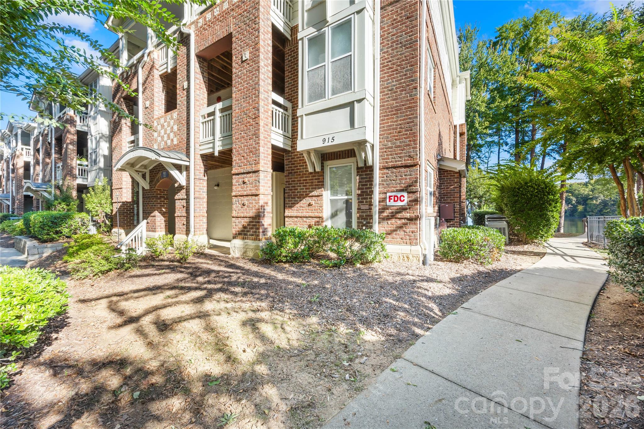 Ground floor corner, waterfront unit. Building #915. - 915 Northeast Drive, Davidson