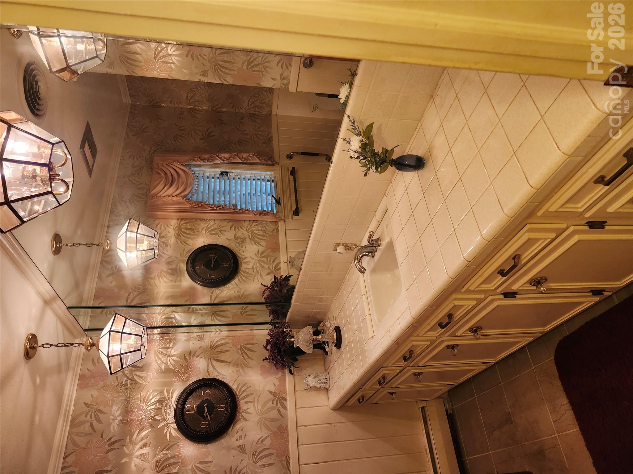 half bath inside house - 2409 Griffith Road, Monroe