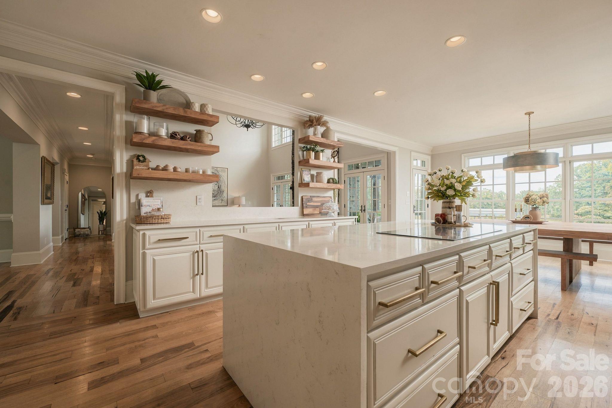 Plenty of kitchen storage & floating shelf accents - 7275 Flowes Store Road, Concord
