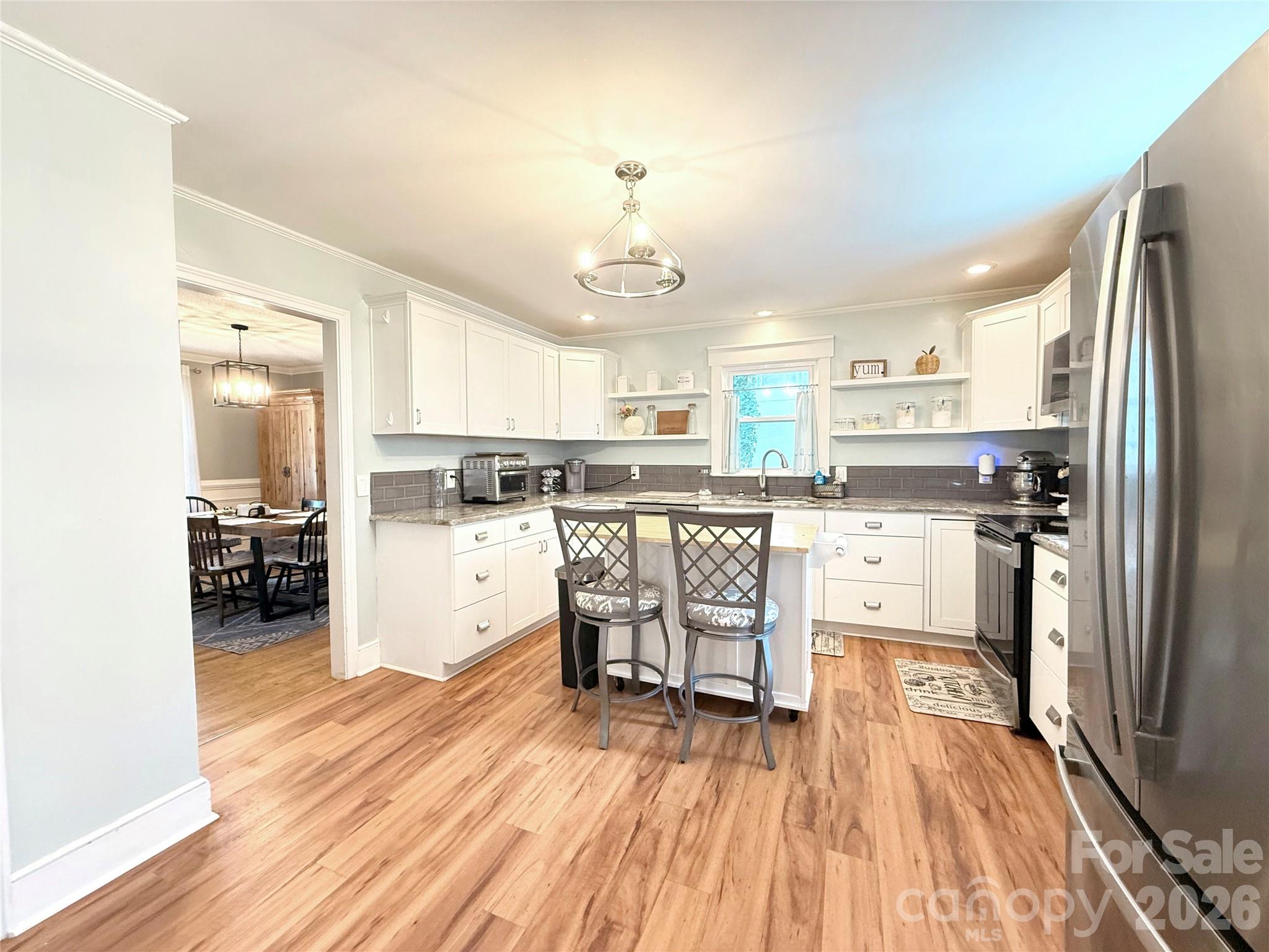 Kitchen with a Pantry & Stainless Steel Appliances - 1131 Richmond Drive, Rock Hill