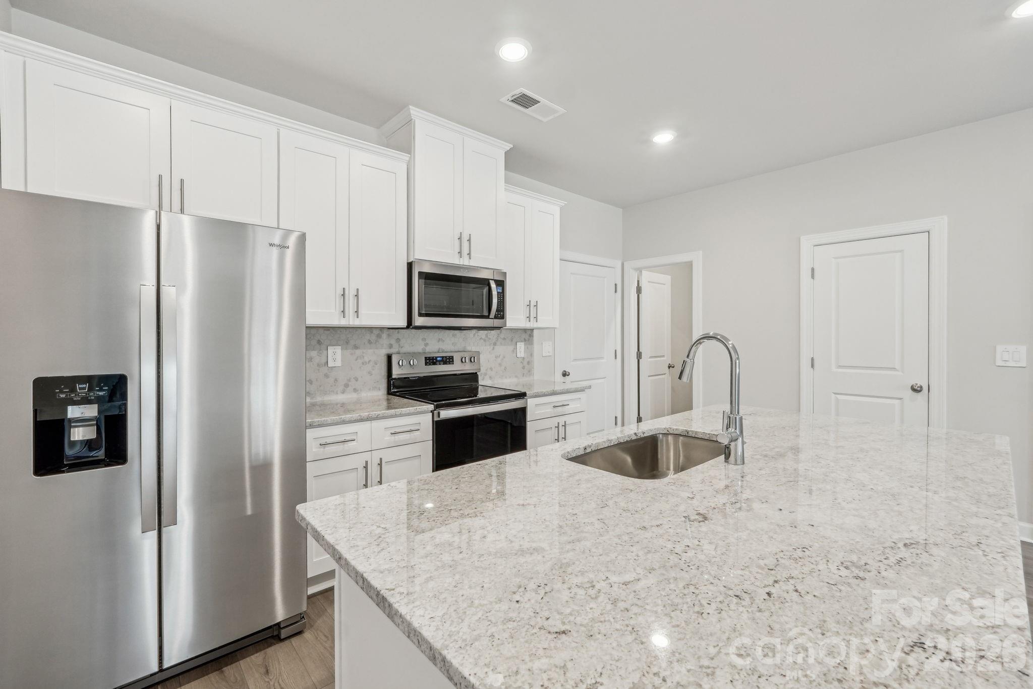 Photo is not of the actual home, but is an inspirational photo of builder’s model home and may depict options, furnishings, and/or decorator features that are not included - 104 Ciara Place, Mooresville