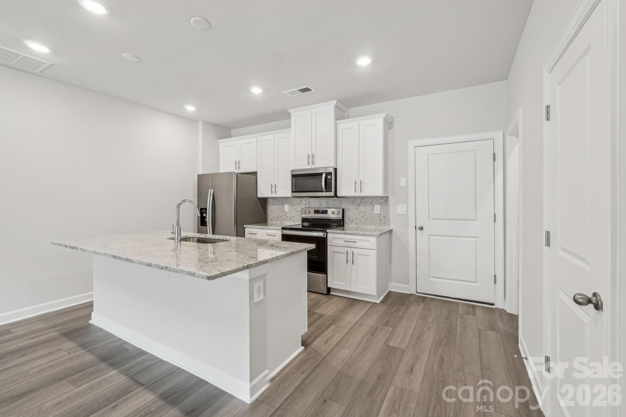 Photo is not of the actual home, but is an inspirational photo of builder’s model home and may depict options, furnishings, and/or decorator features that are not included - 104 Ciara Place, Mooresville