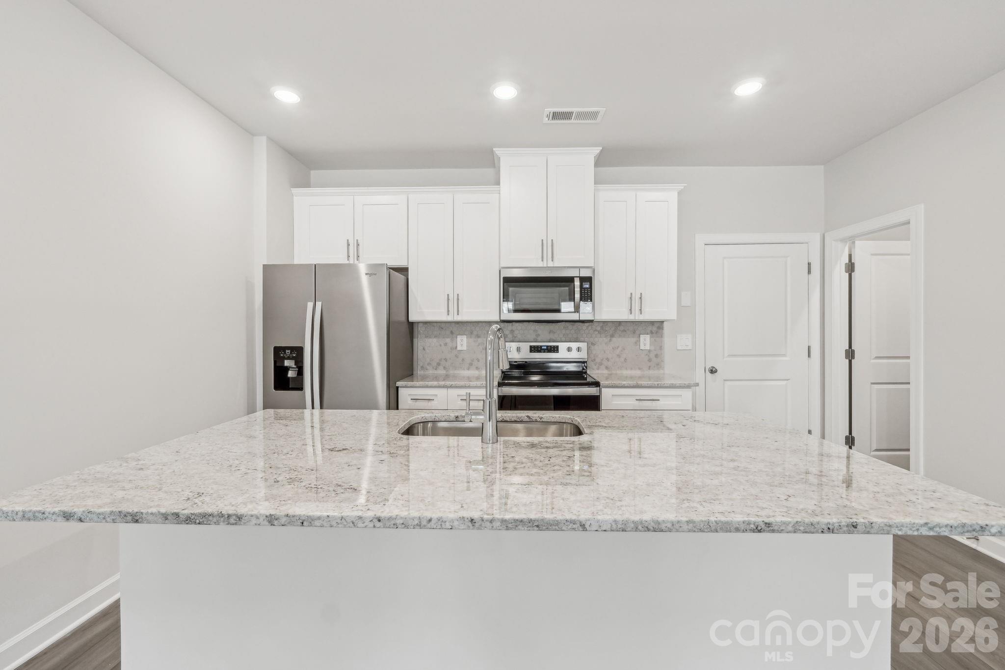 Photo is not of the actual home, but is an inspirational photo of builder’s model home and may depict options, furnishings, and/or decorator features that are not included - 104 Ciara Place, Mooresville