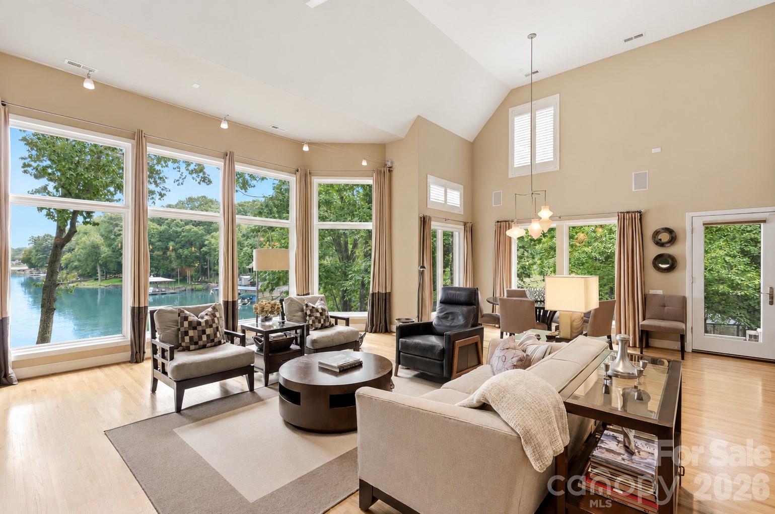 Great room with stunning lake views - 1075 Lakefront Woods Drive, Belmont