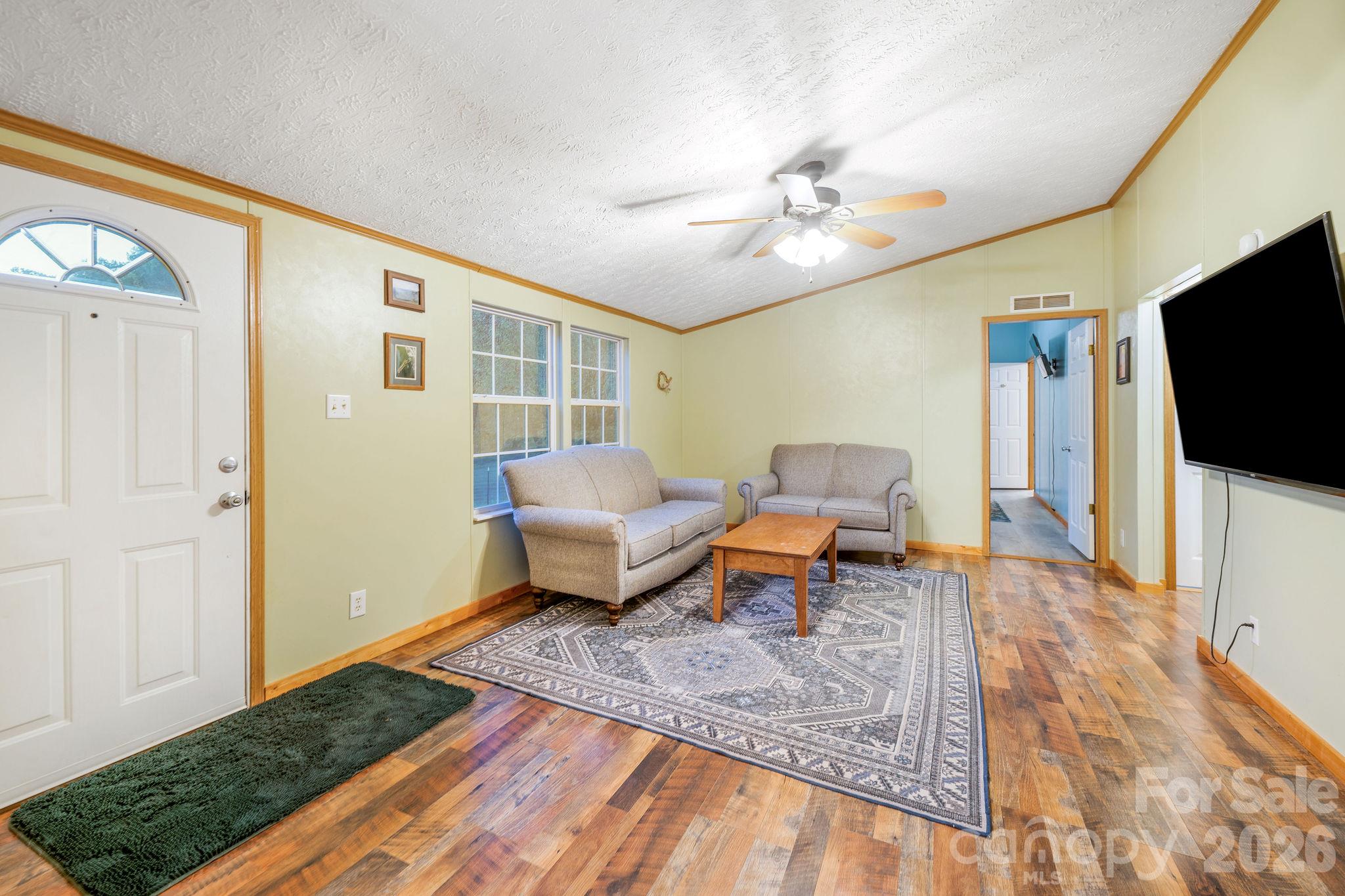 Front entrance and living room. - 1102 Price Town Road, Clyde