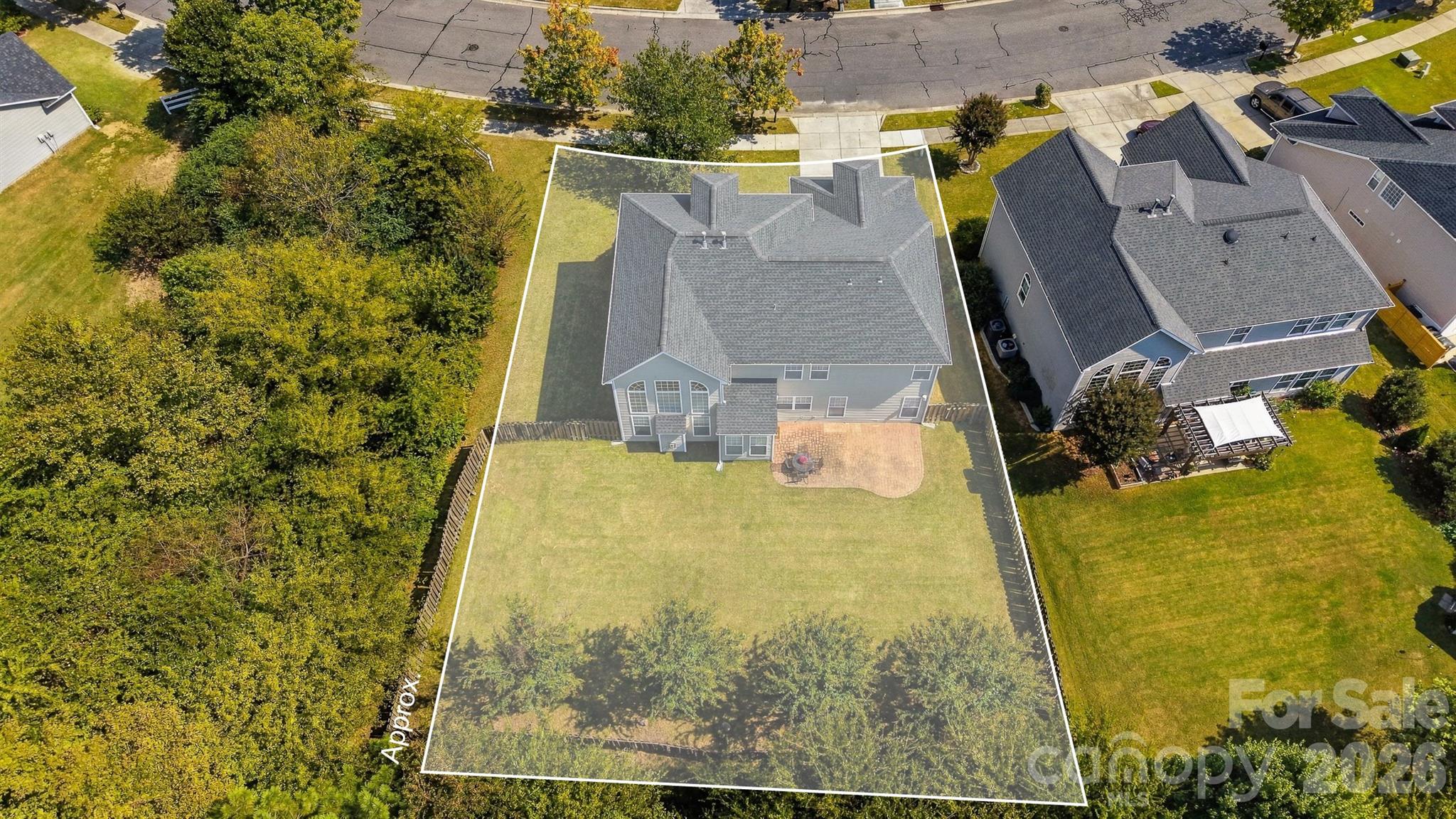 fence encroaches into green space - 4580 Triumph Drive SW, Concord
