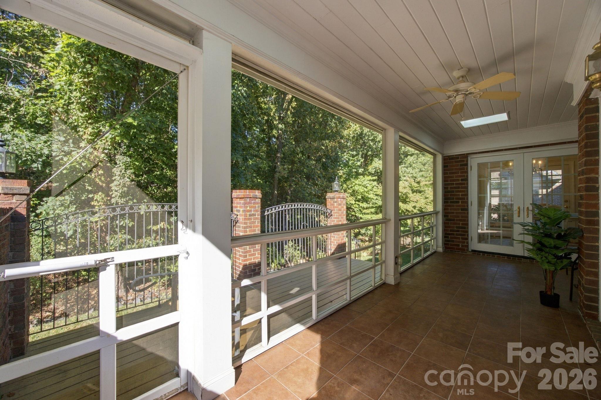 Screened Porch overlooking back terrace - 10417 Newberry Park Lane, Charlotte