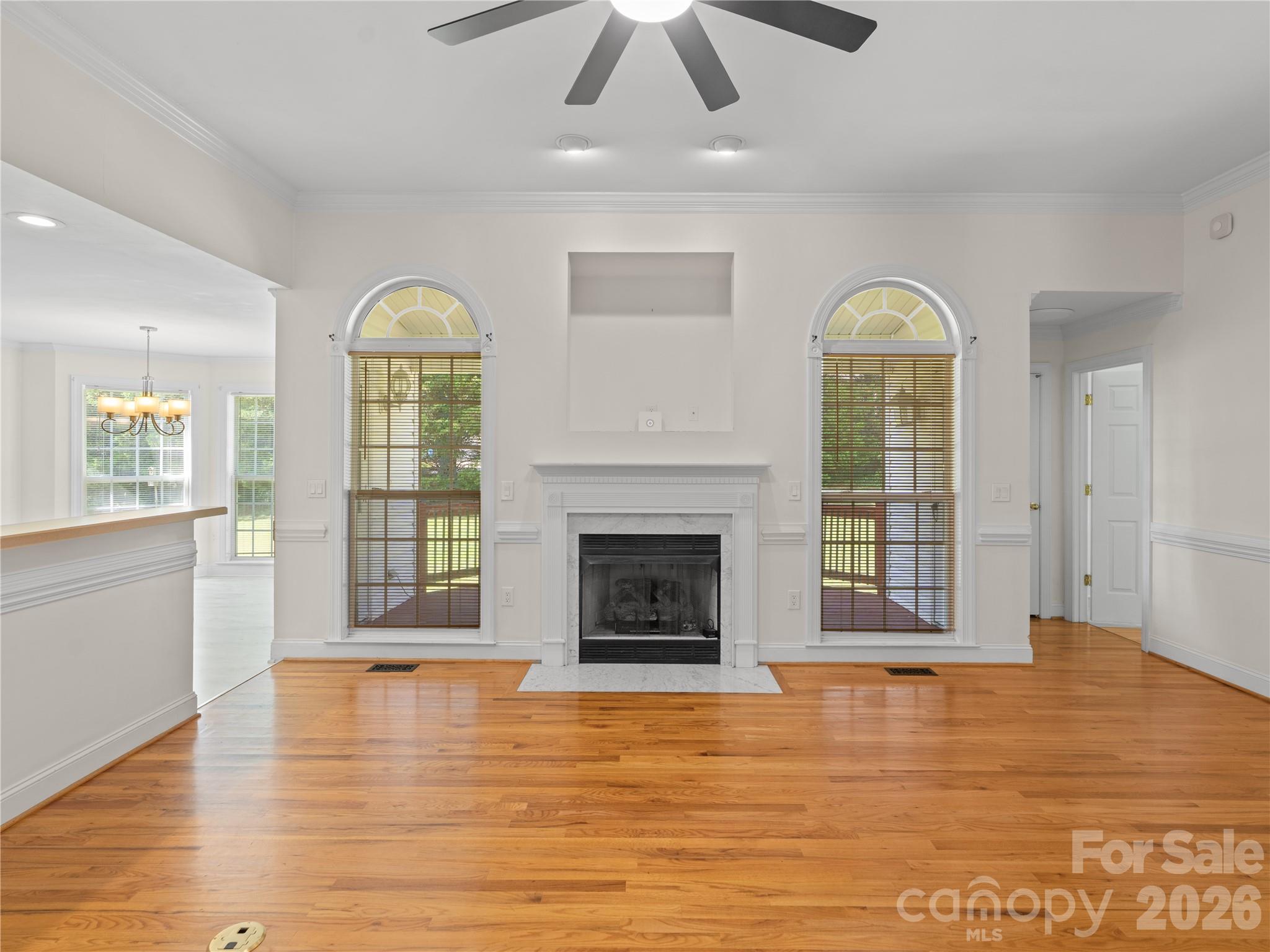 The area to the left is the kitchen and to the right is the entry to the primary suite and secordary entry to the back deck. - 1011 Overhill Road, Salisbury
