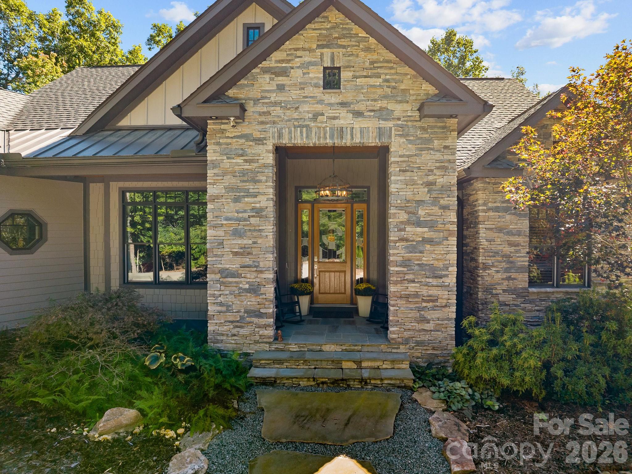 Stacked stone front adds texture and depth - 359 New Castle Road, Brevard