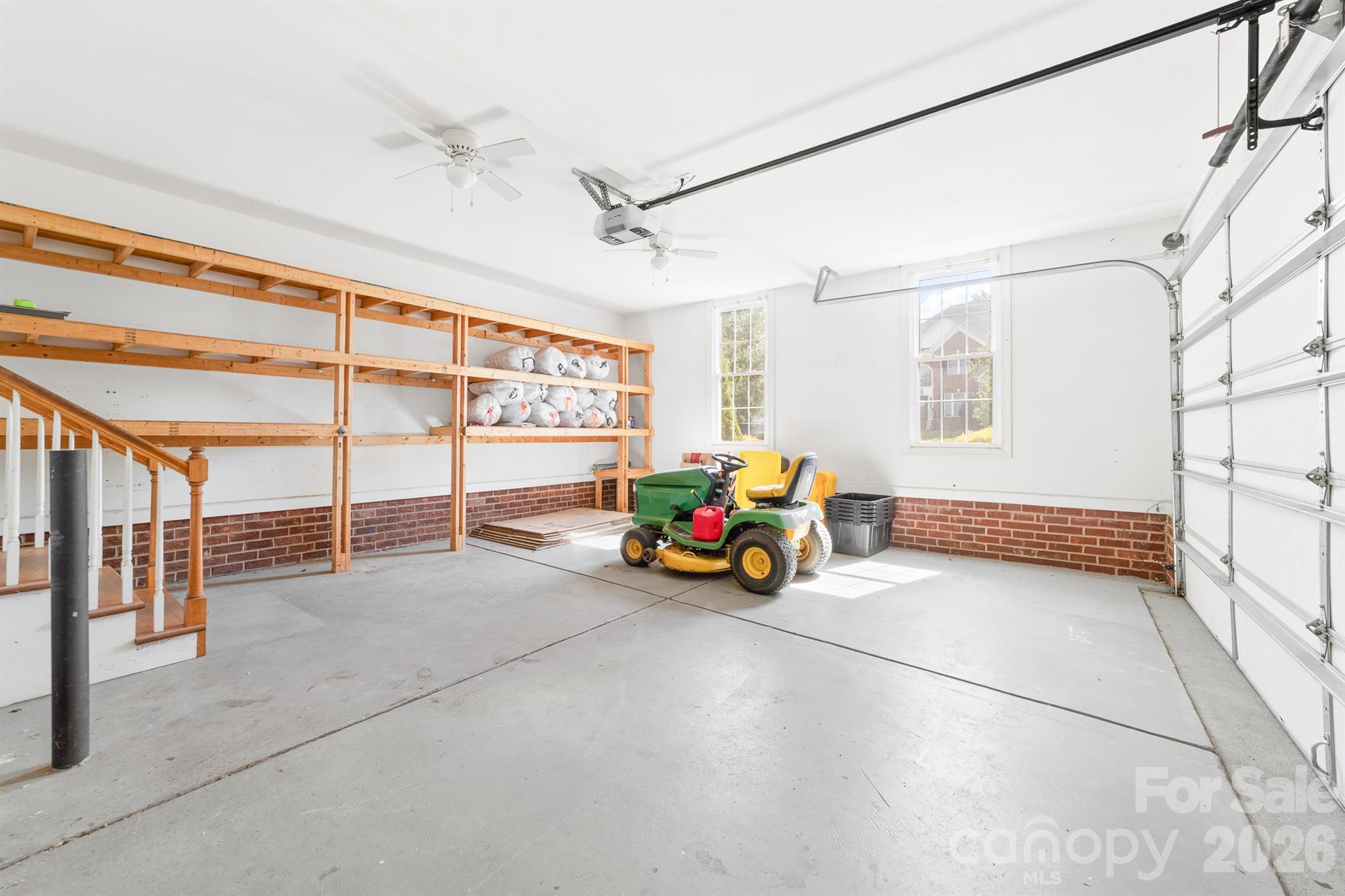 2 car garage with storage shelves - 4014 Belle Meade Circle, Belmont
