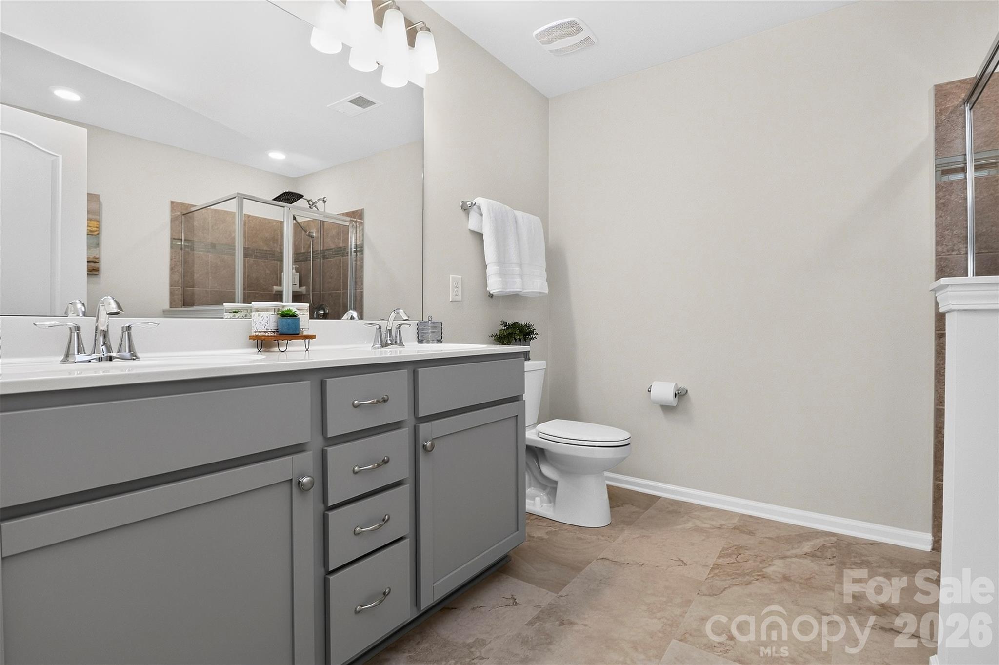 Primary bathroom with his and hers sinks - 8118 English Clover Lane, Indian Land