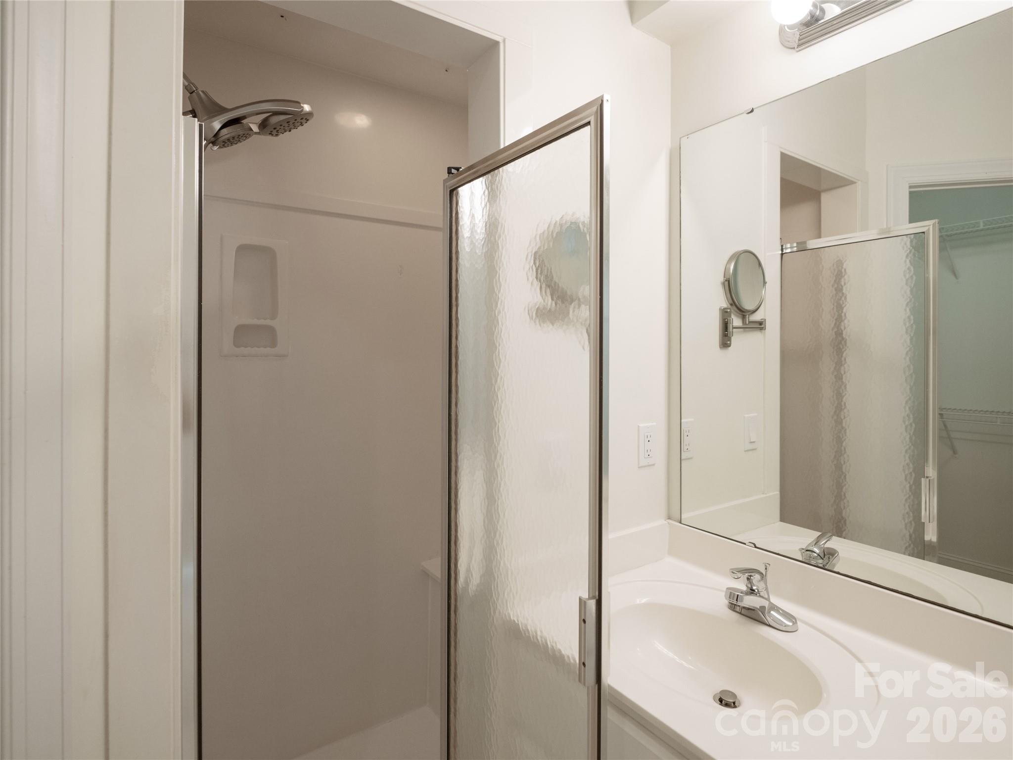 Large walk in shower with shower seat and new hanging and handheld shower heads. - 1011 Overhill Road, Salisbury