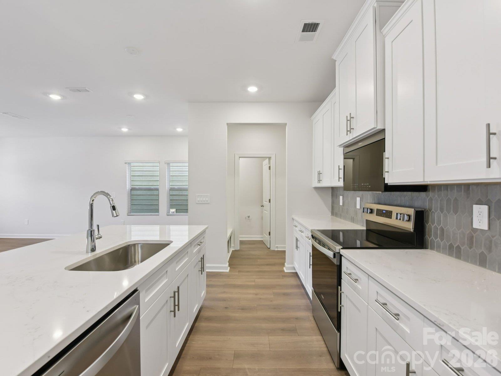 Photos are not of the actual home, but are photos of the builder home with same floorplan with similar interior finishes. - 7292 Yardley Street, Gastonia