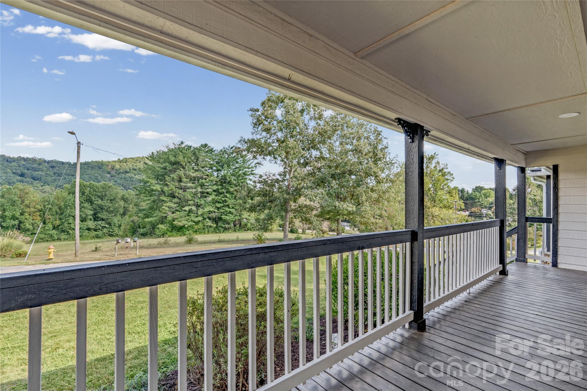 Mountain views from the front porch. - 540 Old Haw Creek Road, Asheville