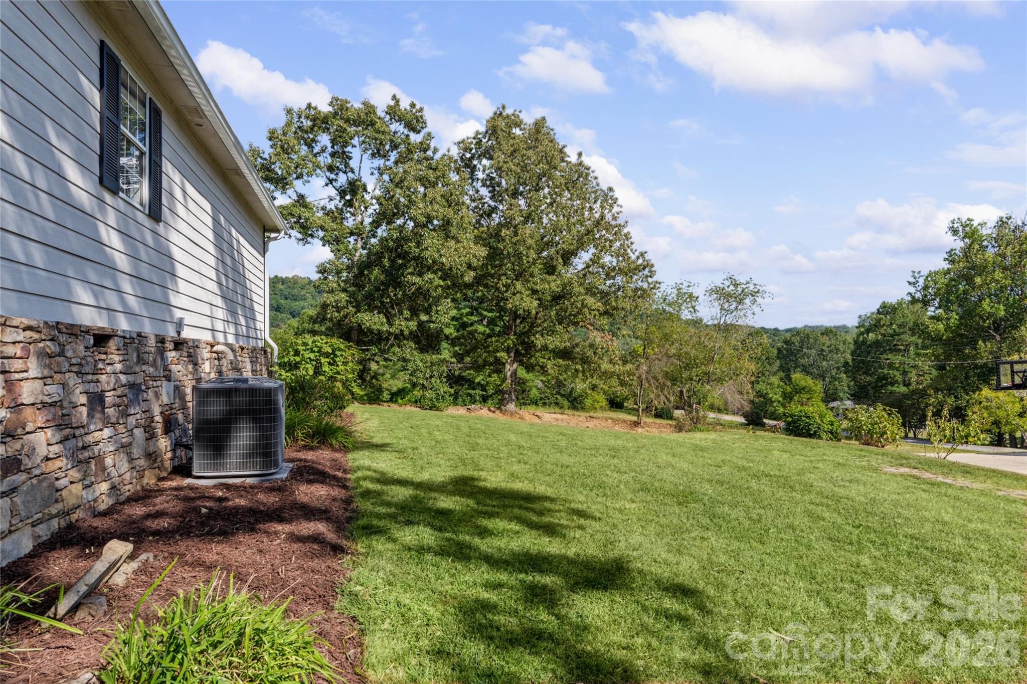 More mountain views from the side yard. - 540 Old Haw Creek Road, Asheville