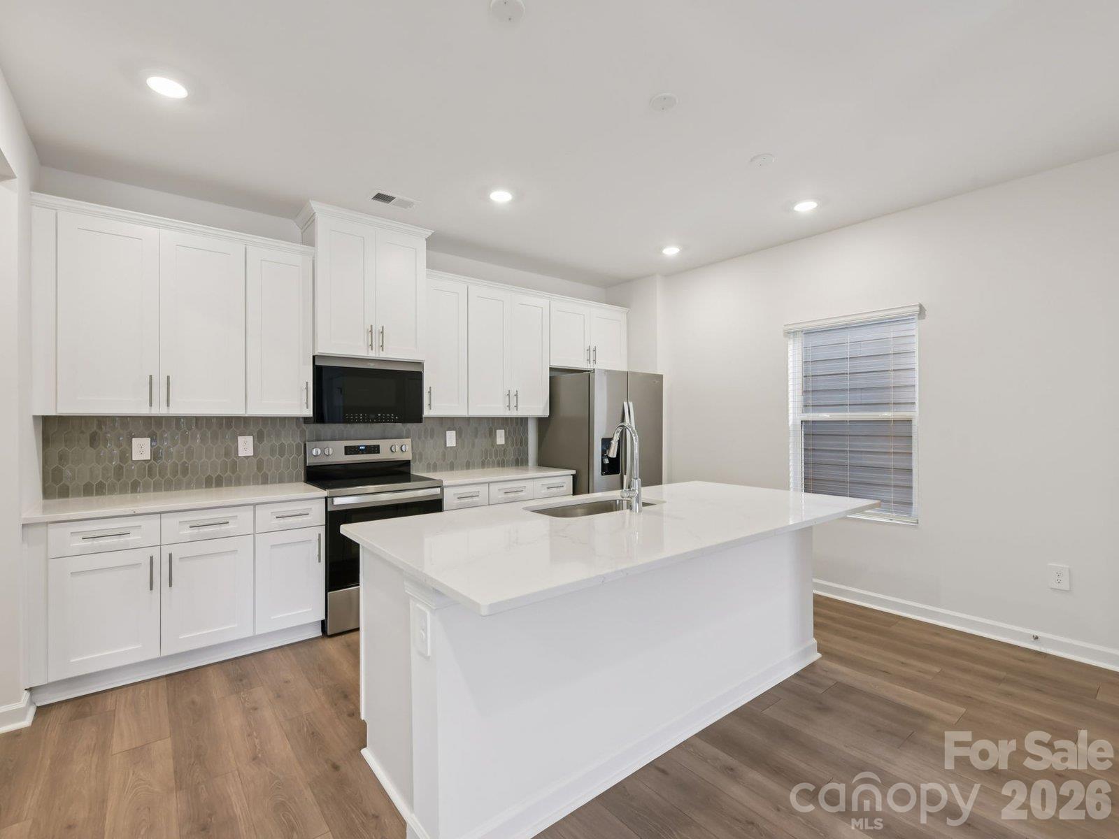 Photos are not of the actual home, but are photos of the builder home with same floorplan with similar interior finishes. - 7293 Yardley Street, Gastonia
