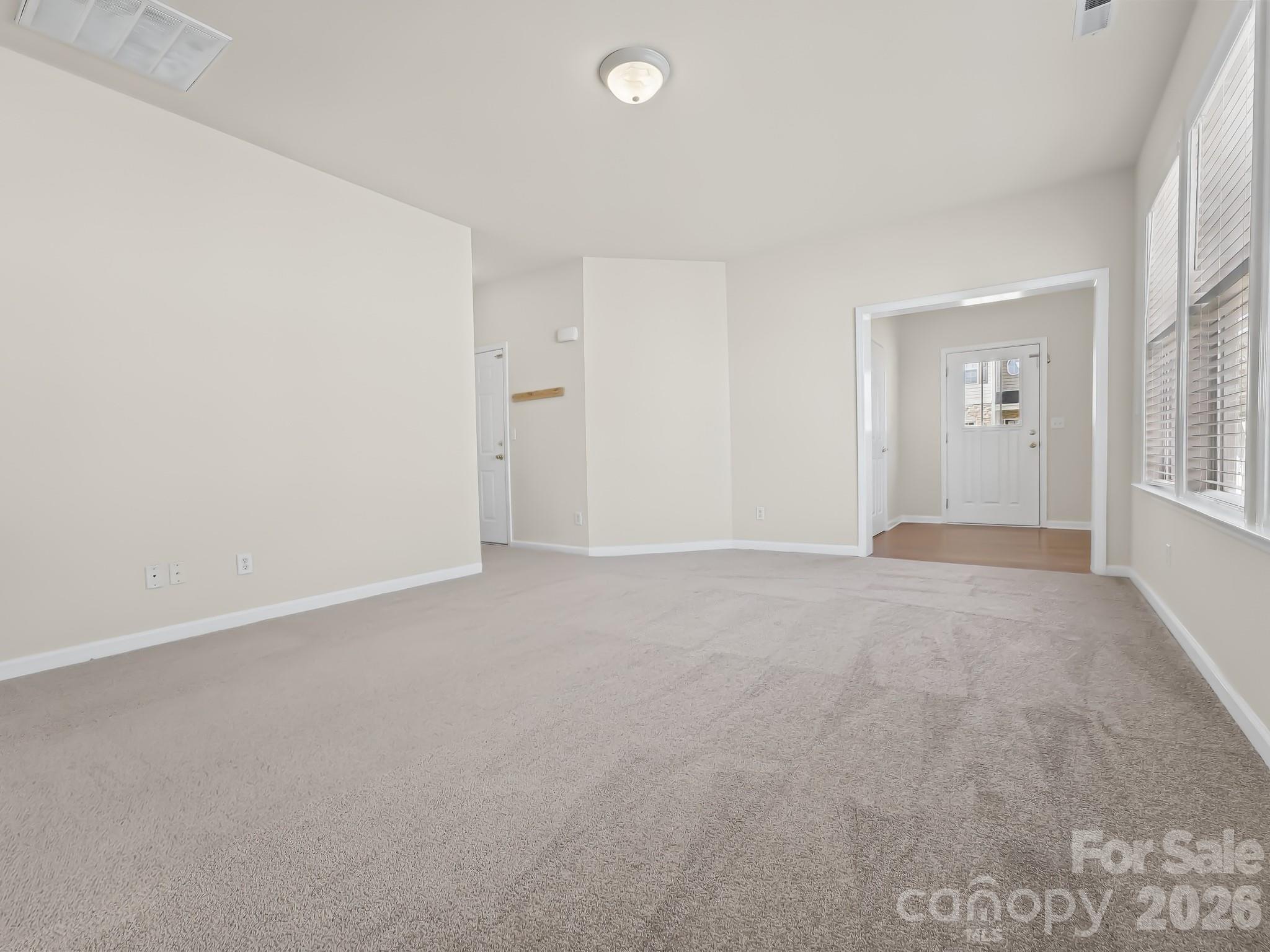 View to front entry with half bath - 15 Chowan Drive, Fletcher