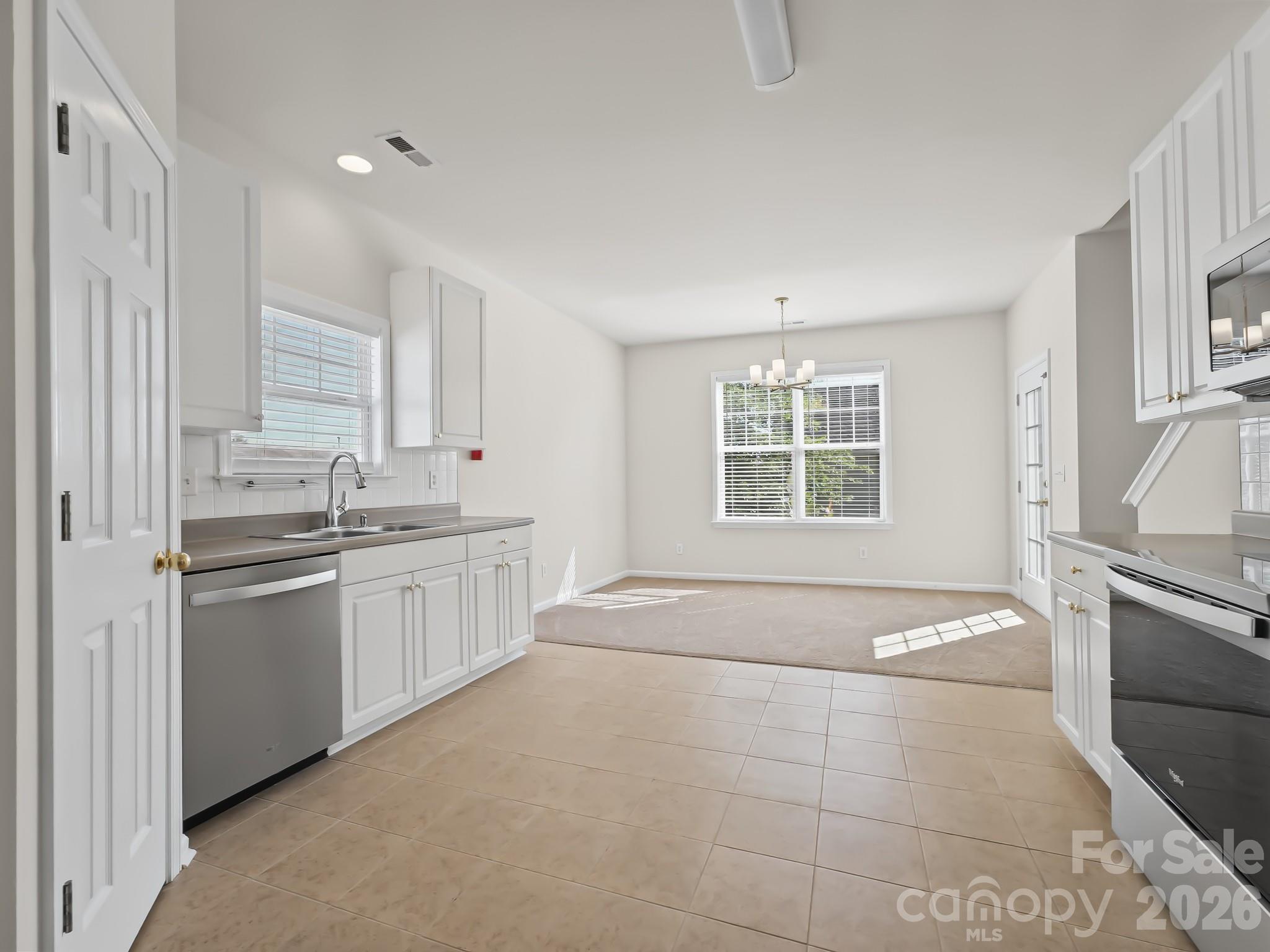 Kitchen has all new stainless steel appliances - 15 Chowan Drive, Fletcher